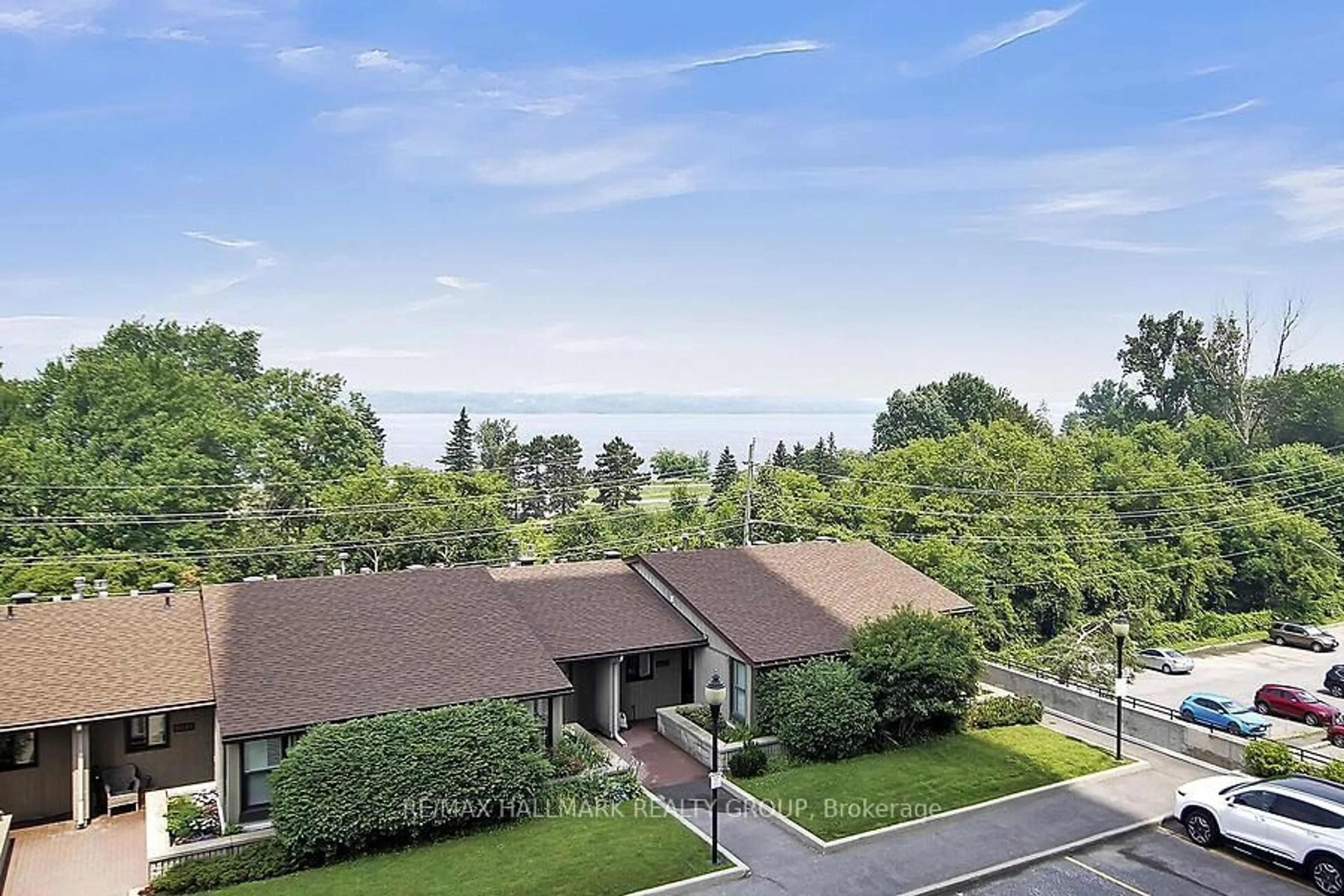 A pic from outside/outdoor area/front of a property/back of a property/a pic from drone, mountain view for 1081 Ambleside Dr #410, Ottawa Ontario K2B 8C8