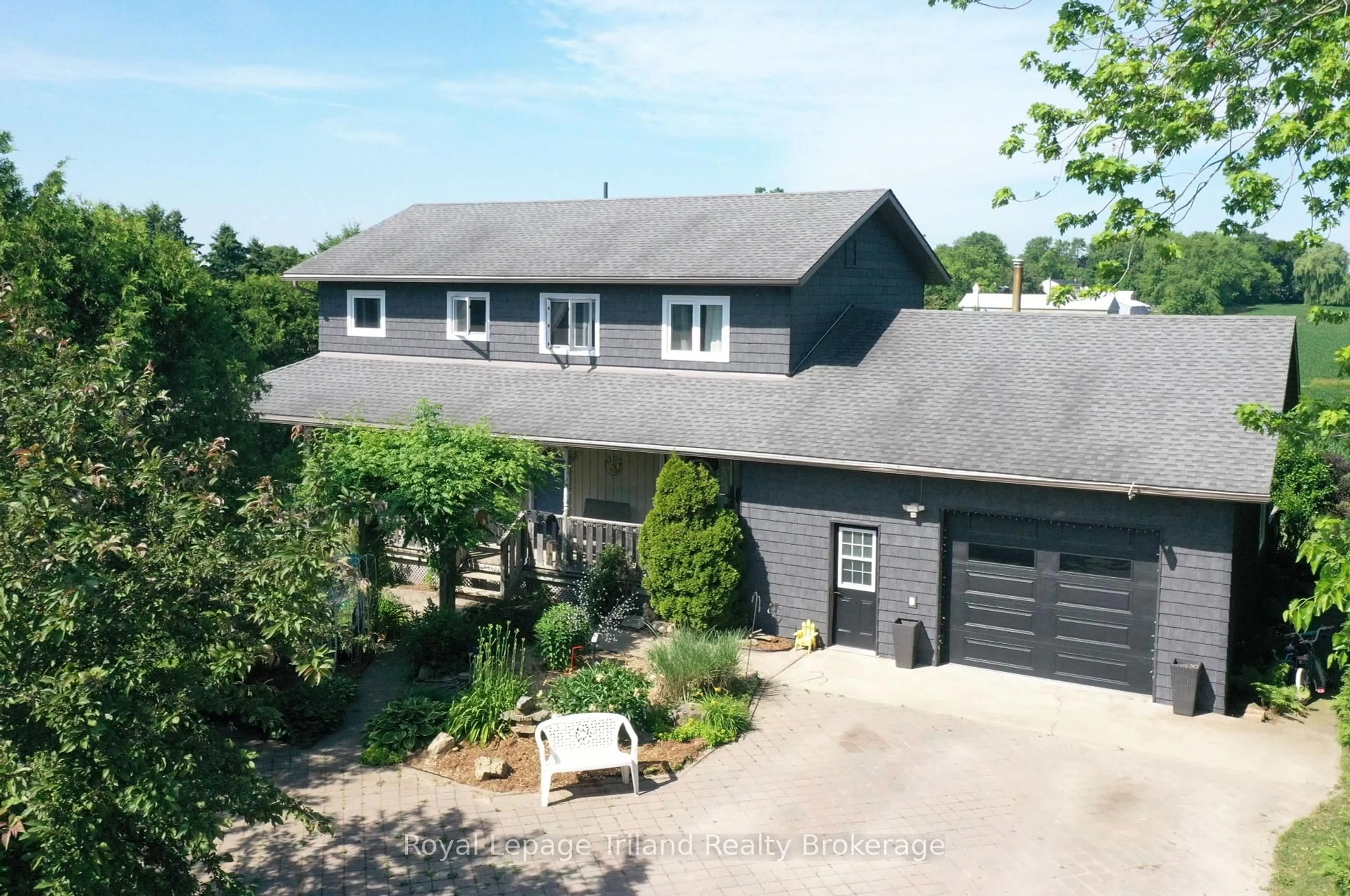 A pic from outside/outdoor area/front of a property/back of a property/a pic from drone, street for 714653 Middletown Line, Norwich Ontario N4S 7W3