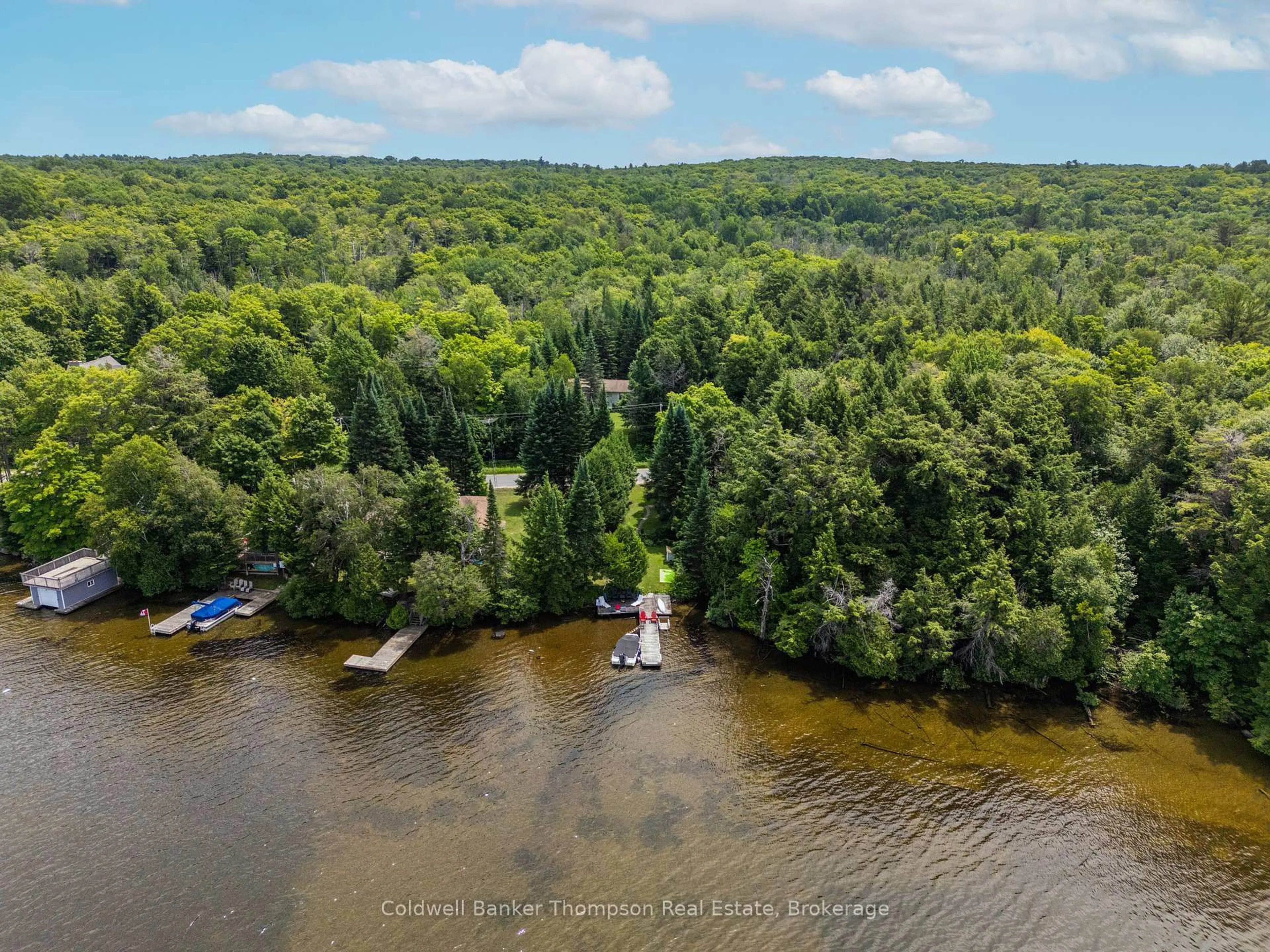 A pic from outside/outdoor area/front of a property/back of a property/a pic from drone, water/lake/river/ocean view for 1378 Old Hwy 117, Lake of Bays Ontario P0B 1A0