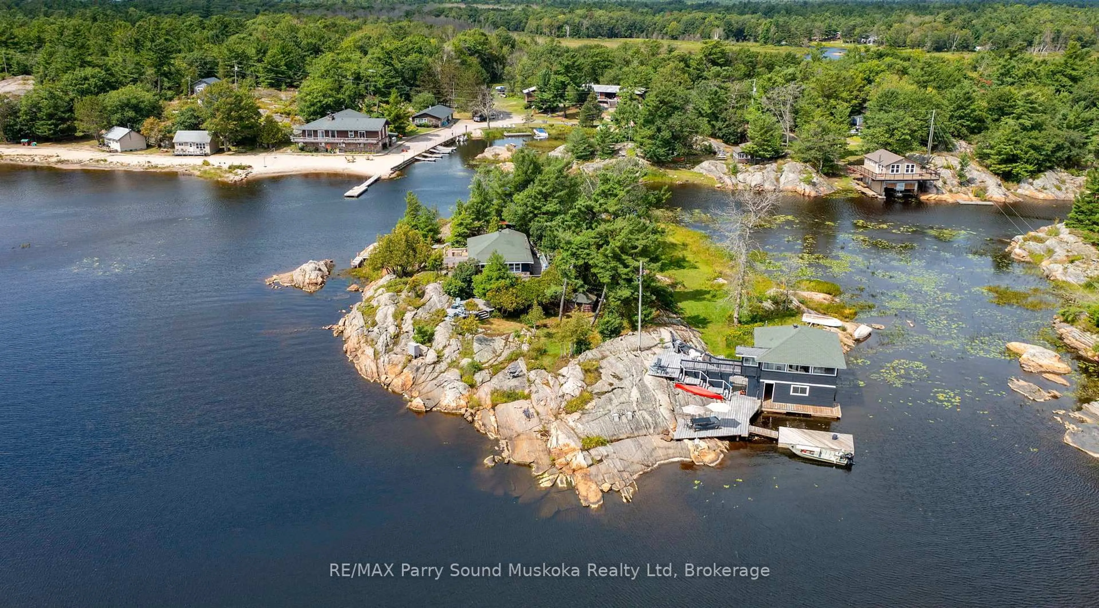 A pic from outside/outdoor area/front of a property/back of a property/a pic from drone, water/lake/river/ocean view for 1 ISLAND 271C, Carling Ontario P0G 1G0