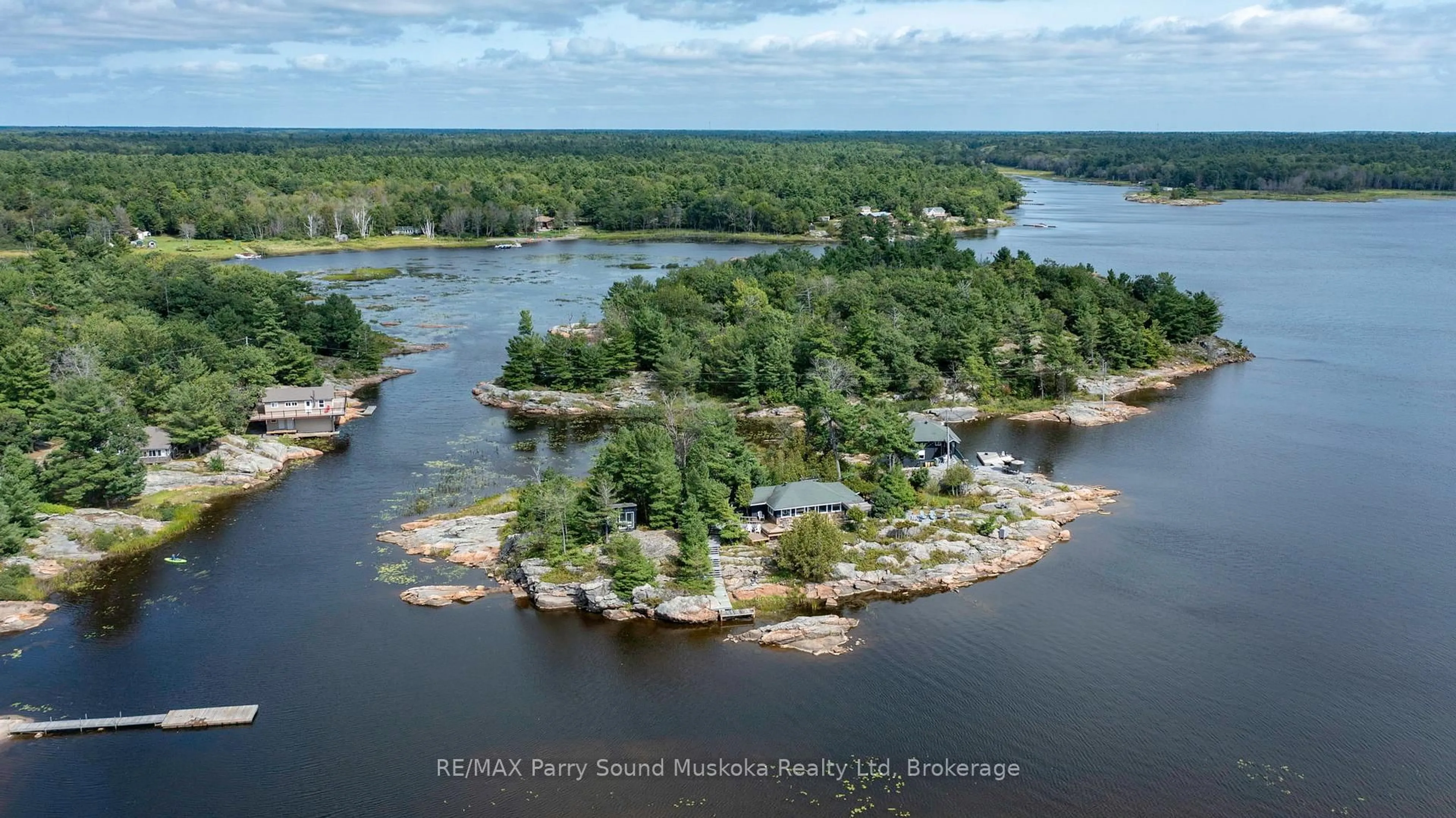 A pic from outside/outdoor area/front of a property/back of a property/a pic from drone, water/lake/river/ocean view for 1 ISLAND 271C, Carling Ontario P0G 1G0