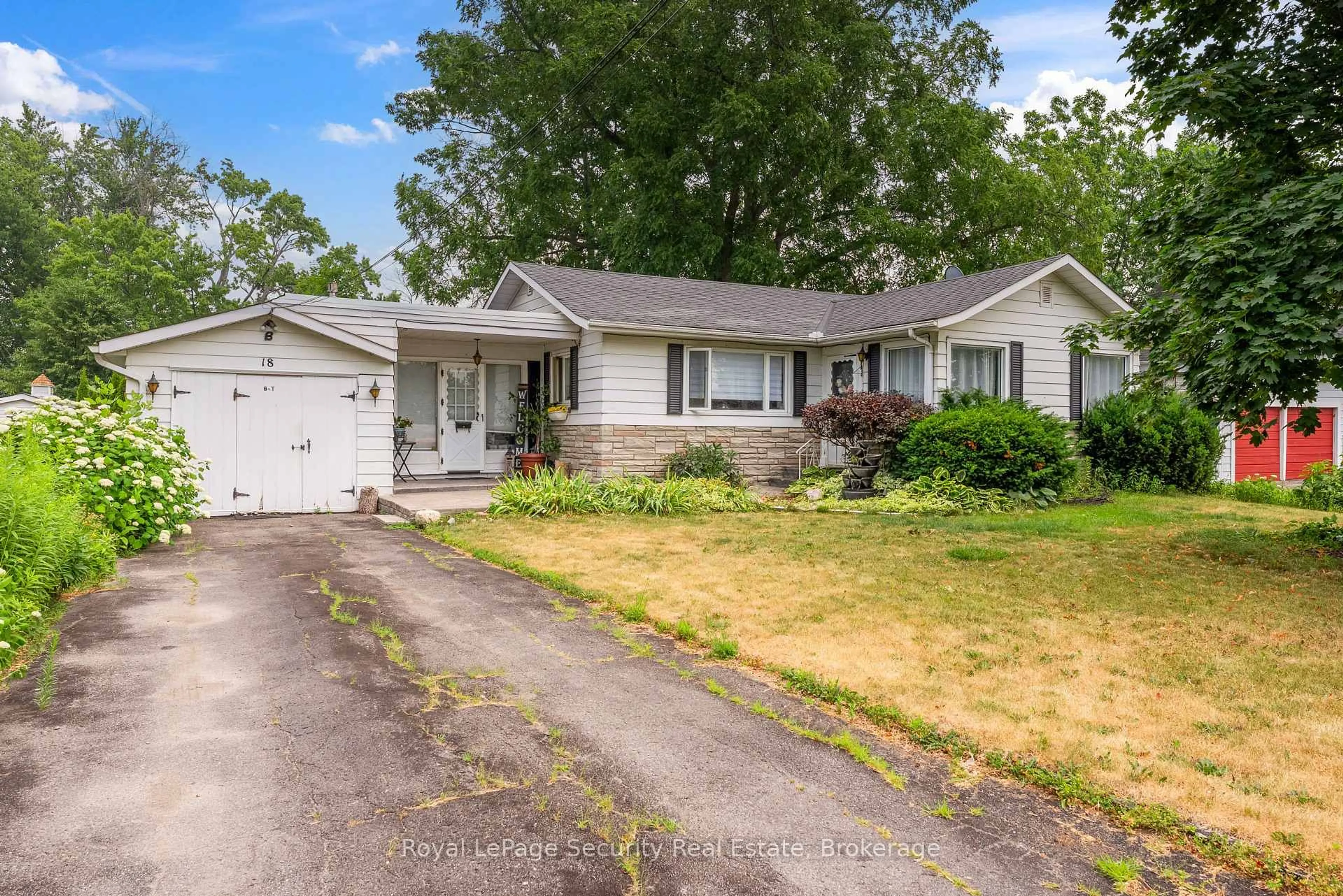 Home with vinyl exterior material, street for 18 Ashley St, Quinte West Ontario K0K 2B0