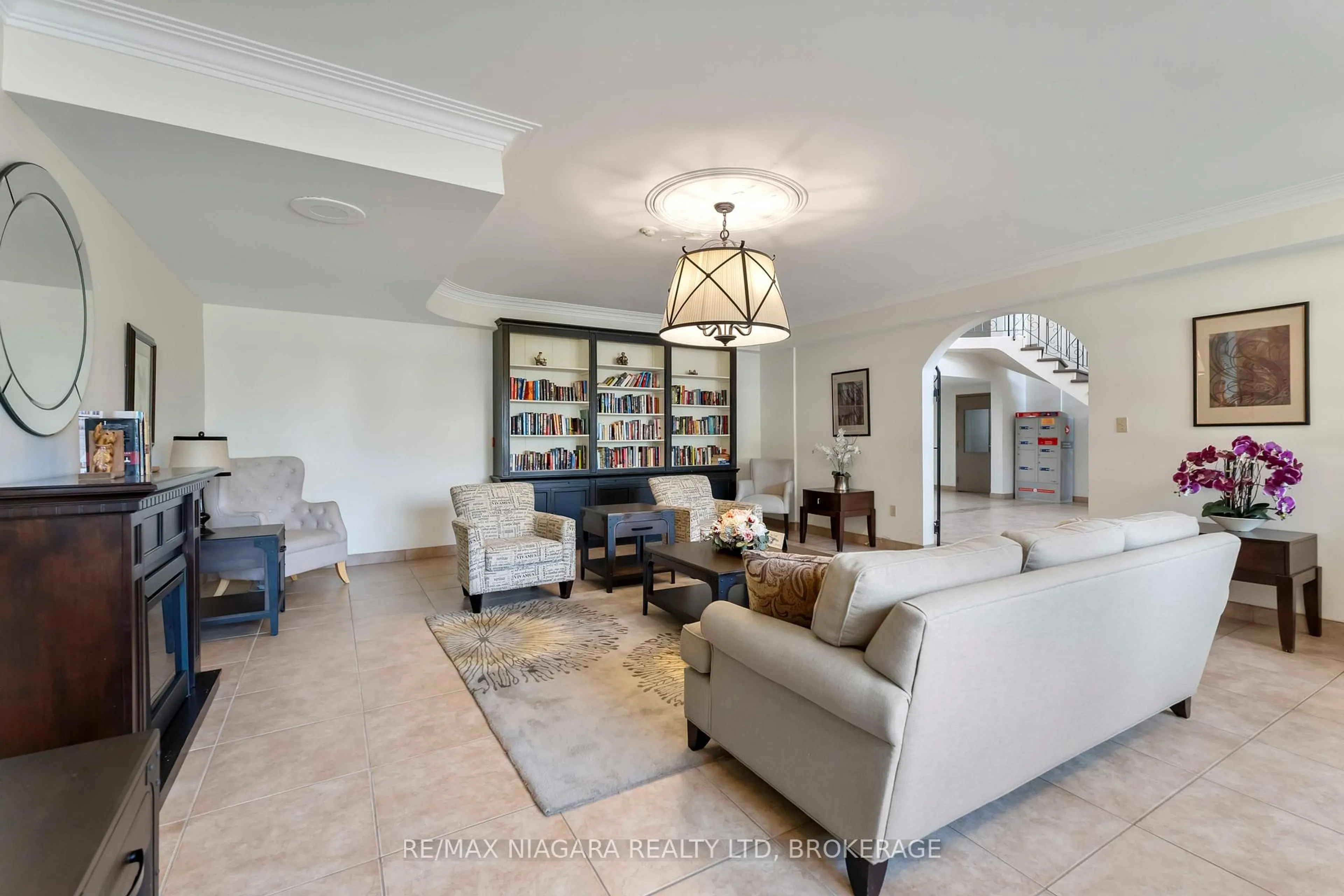 Living room with furniture, ceramic/tile floor for 365 Geneva St #602, St. Catharines Ontario L2N 5S7