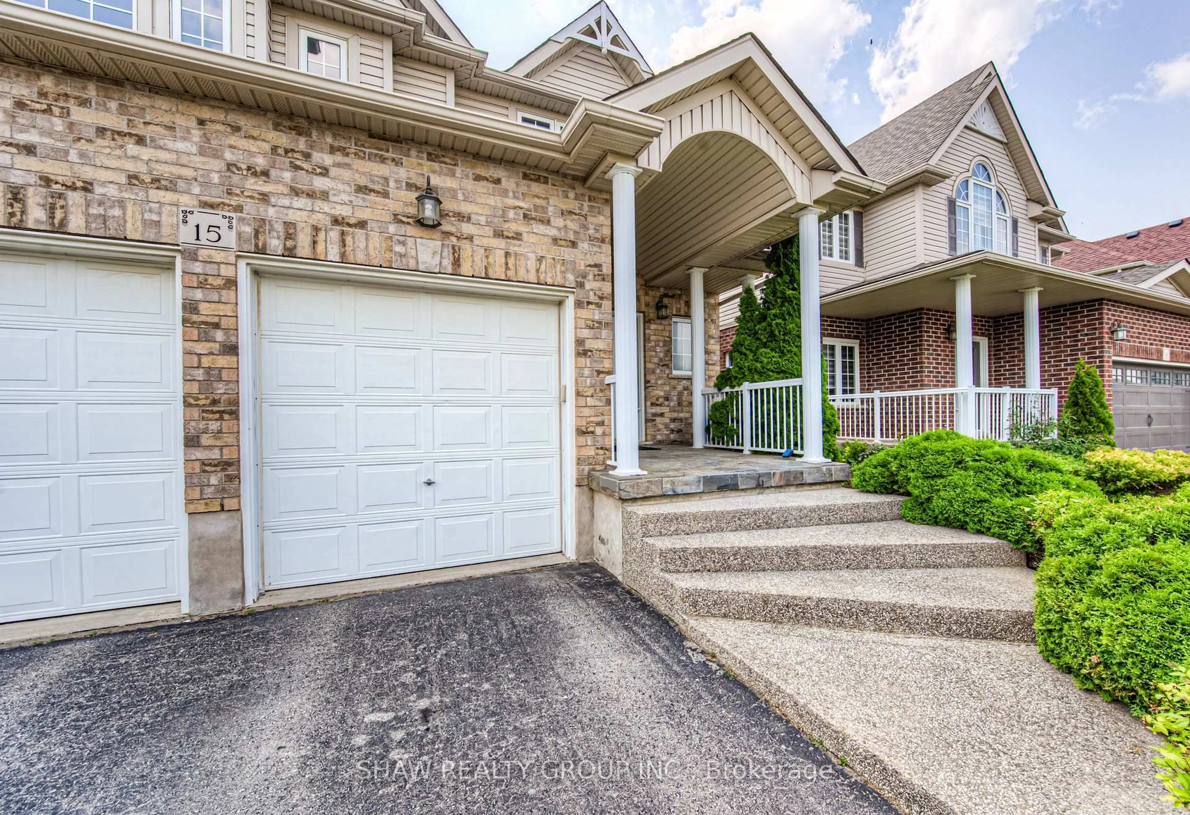 Home with brick exterior material, street for 15 Woodbine Ave, Kitchener Ontario N2R 1V9