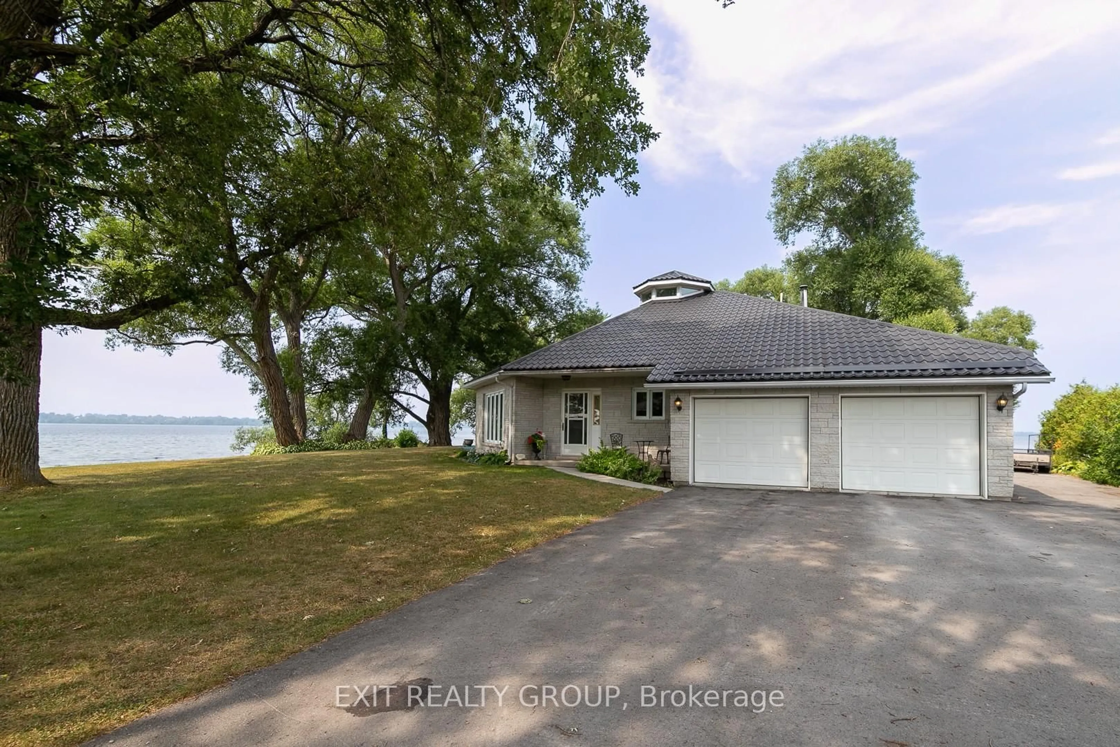 A pic from outside/outdoor area/front of a property/back of a property/a pic from drone, water/lake/river/ocean view for 45 Peats Point Lane, Prince Edward County Ontario K8N 4Z7