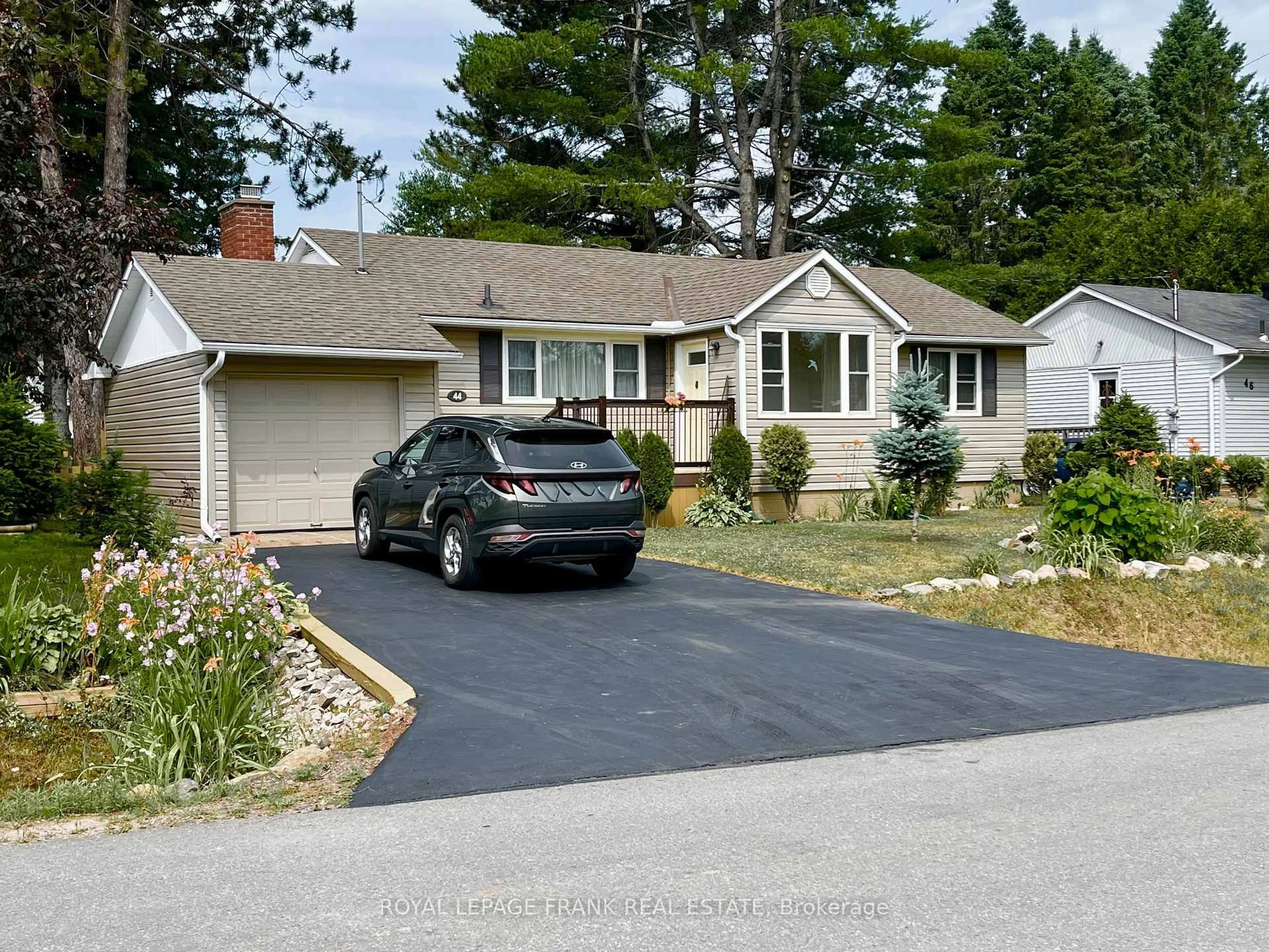 Home with vinyl exterior material, street for 44 Hemlock St, Highlands East Ontario K0L 1M0