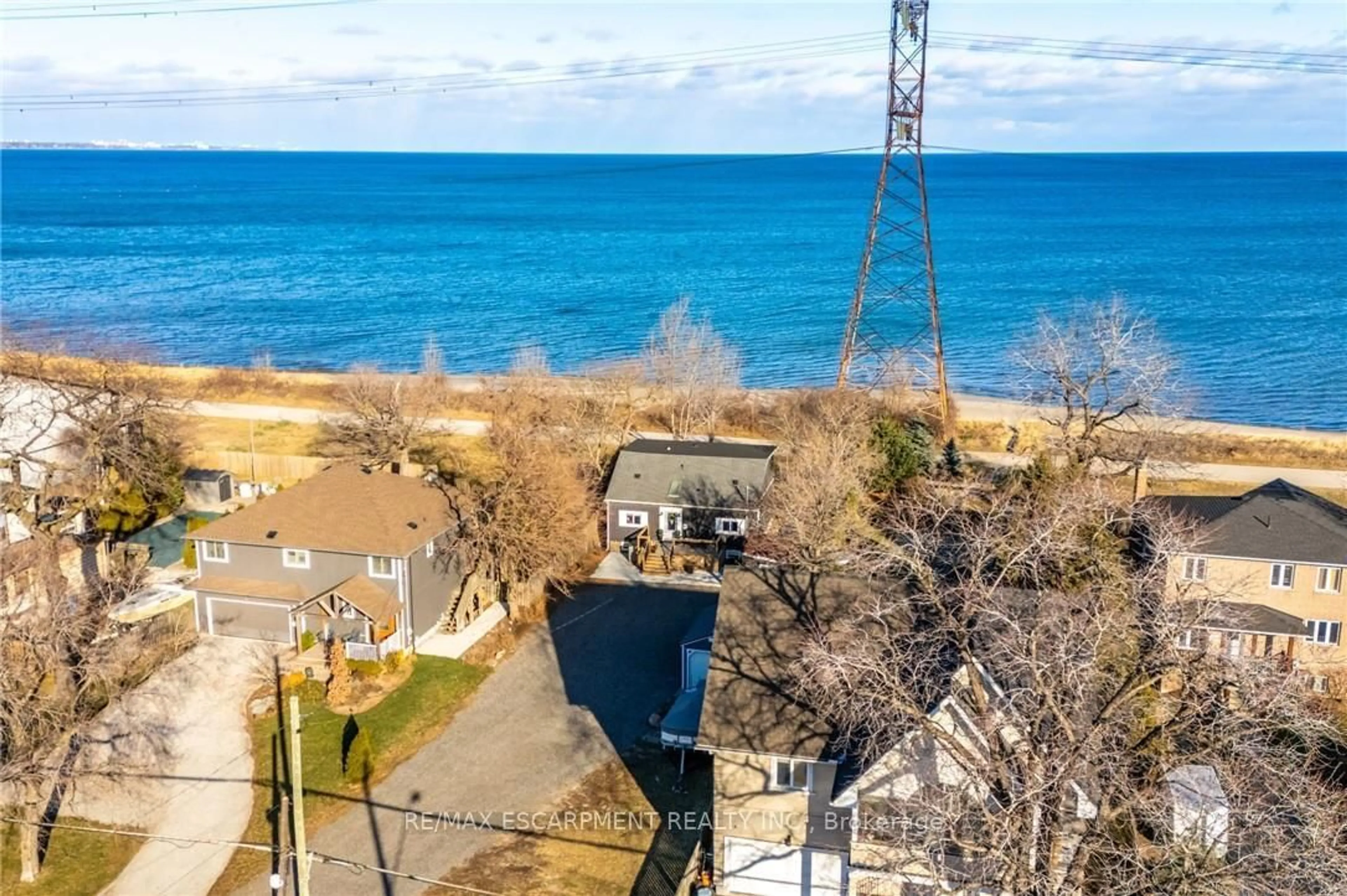 A pic from outside/outdoor area/front of a property/back of a property/a pic from drone, water/lake/river/ocean view for 735 Beach Blvd, Hamilton Ontario L8H 6Y5