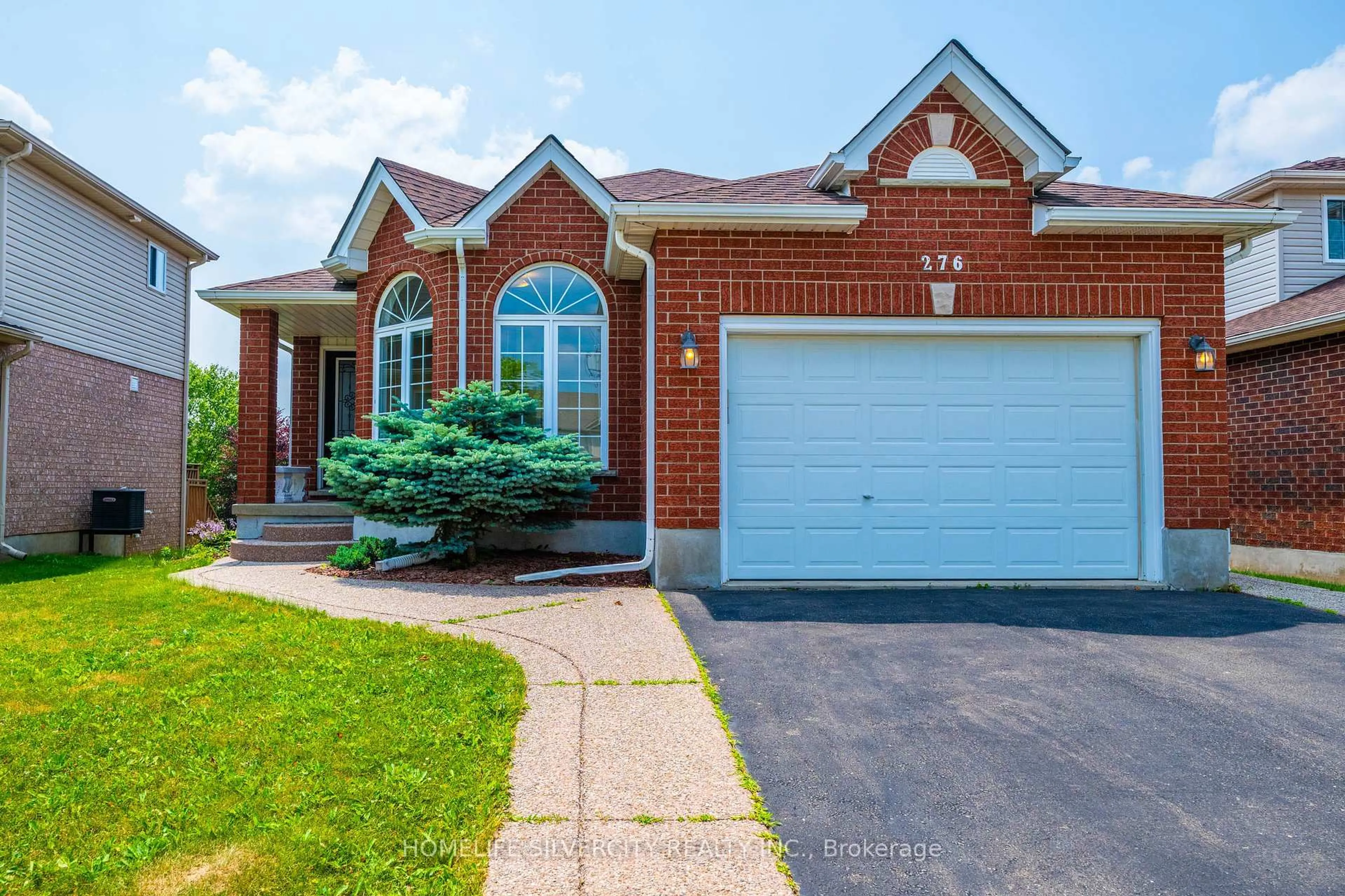 Home with brick exterior material, street for 276 Watson Pkwy, Guelph Ontario N1E 7J5