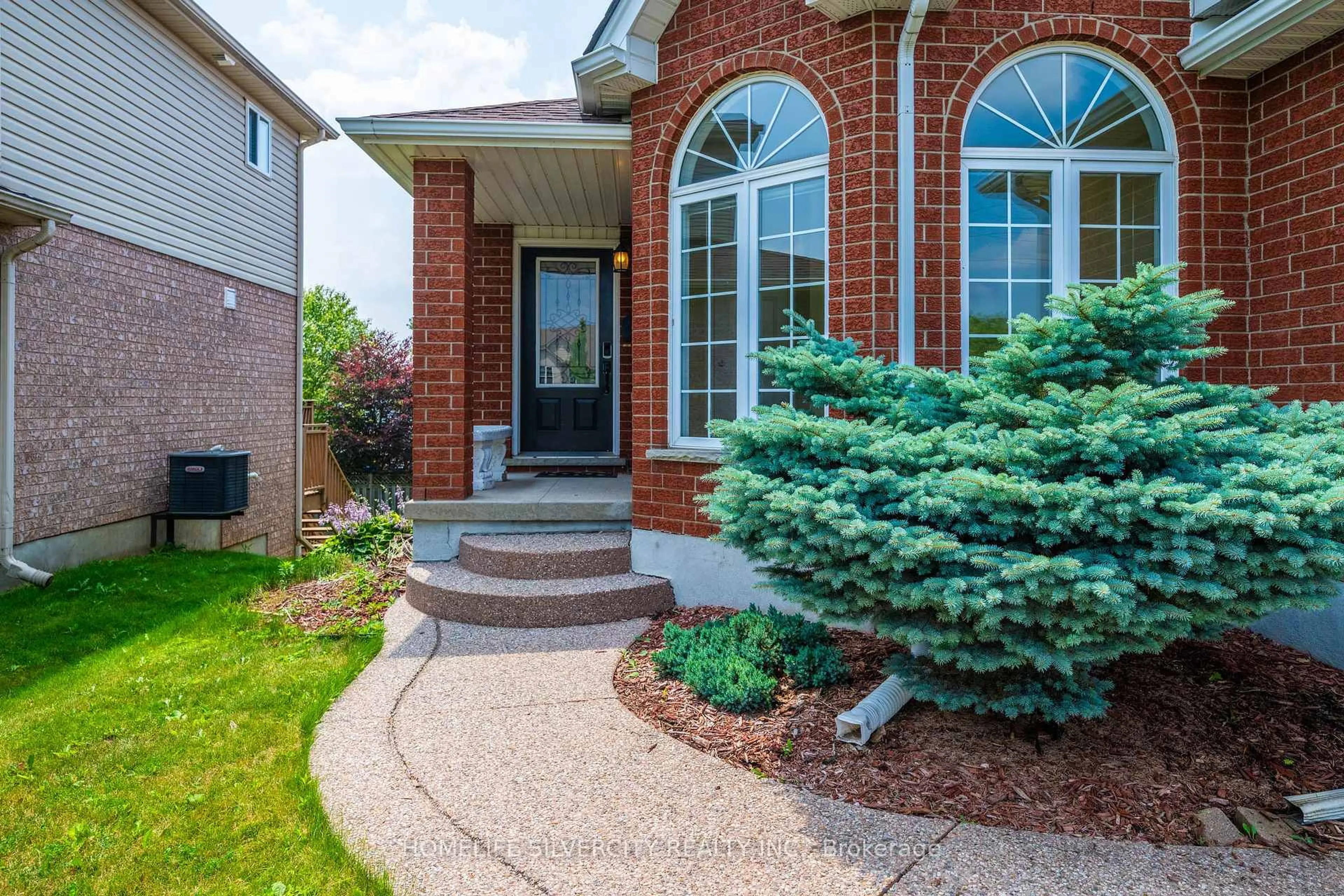 Home with brick exterior material, street for 276 Watson Pkwy, Guelph Ontario N1E 7J5