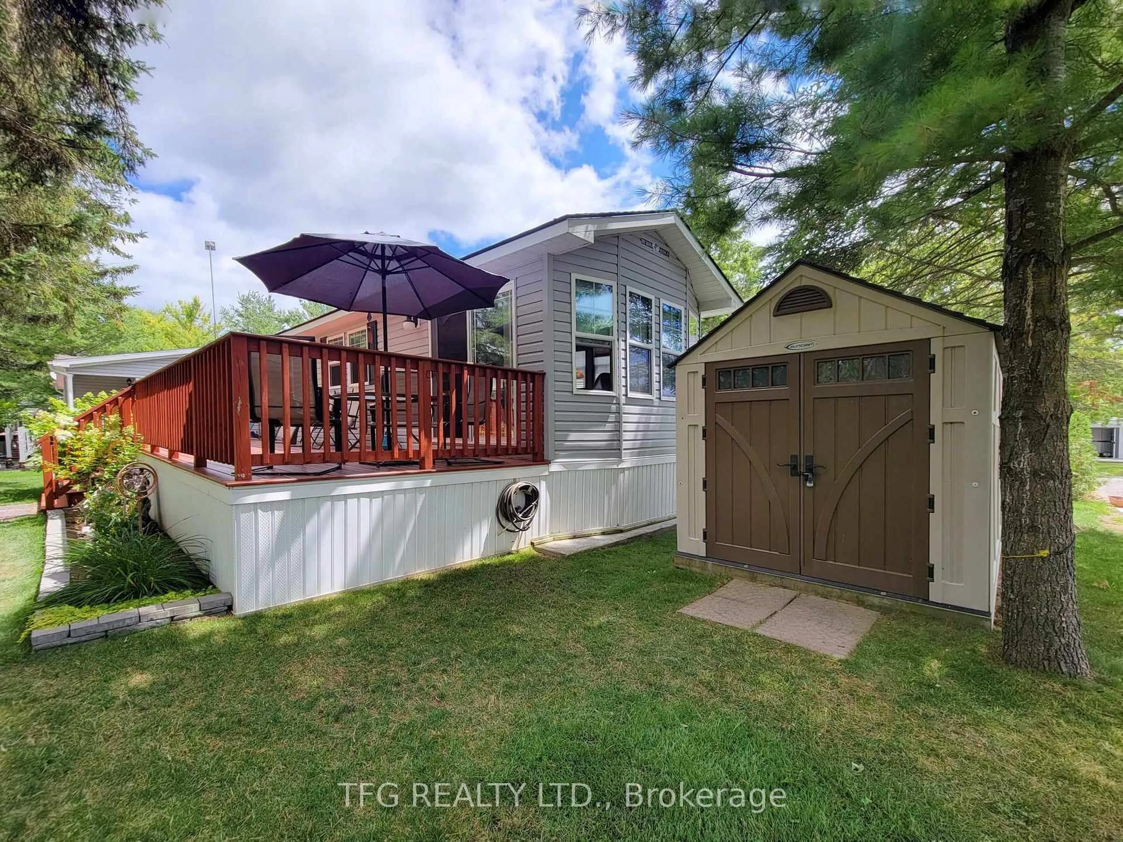A pic from outside/outdoor area/front of a property/back of a property/a pic from drone, street for 3-2152 County Rd 36 Rd, Kawartha Lakes Ontario K0M 1L0