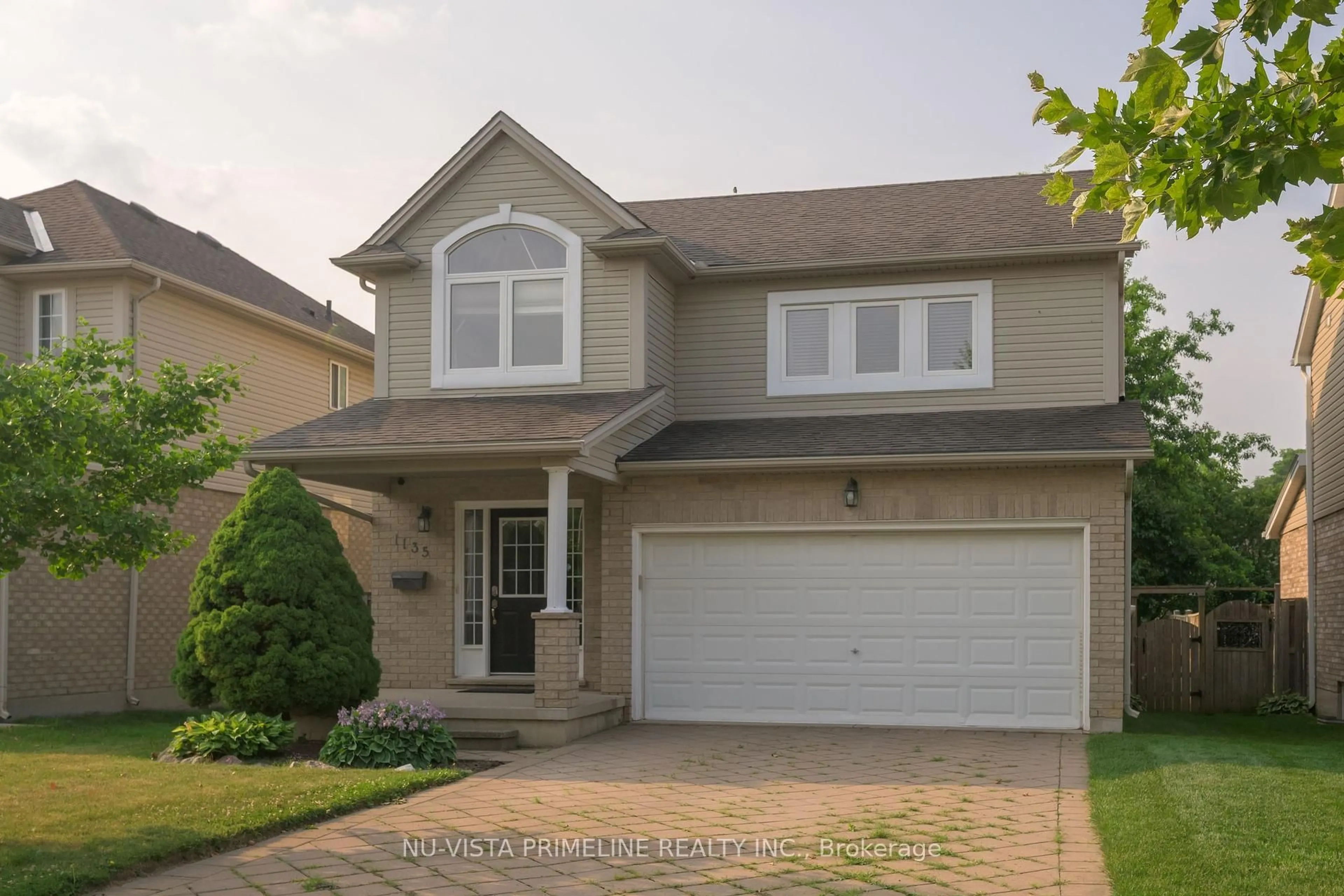 Home with vinyl exterior material, street for 1135 South Wenige Dr, London North Ontario N5X 4G5