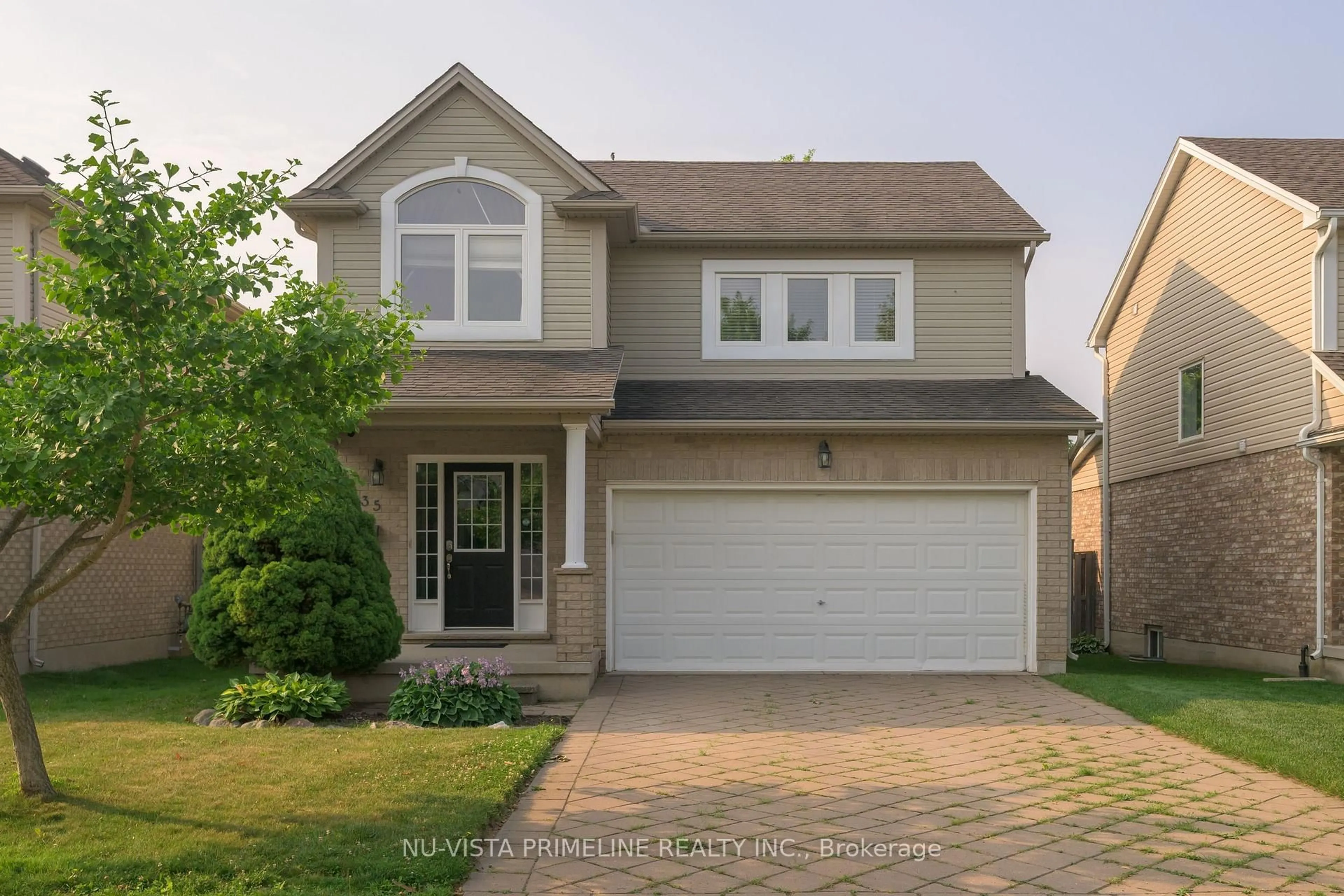 Home with vinyl exterior material, street for 1135 South Wenige Dr, London North Ontario N5X 4G5