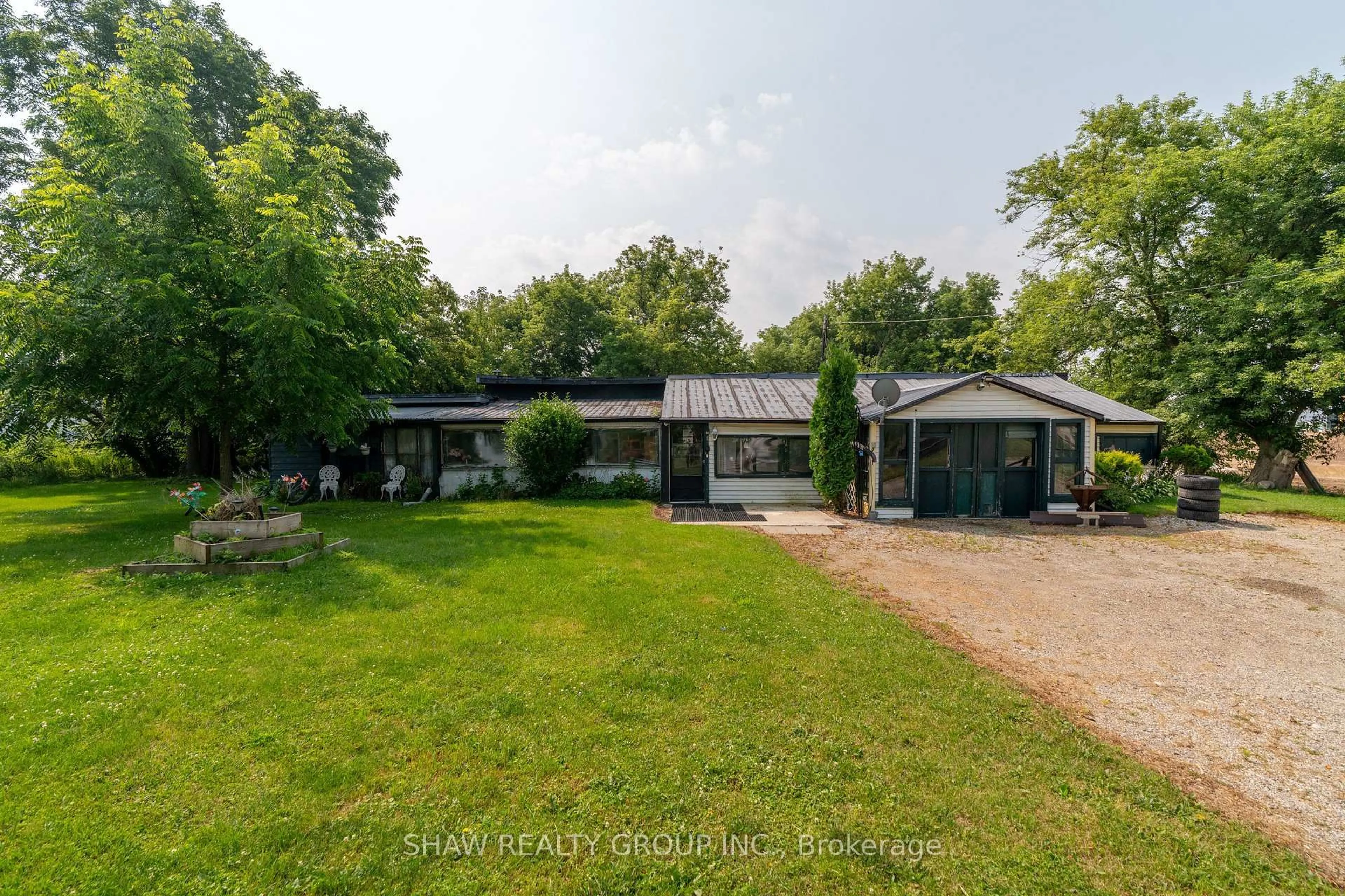 A pic from outside/outdoor area/front of a property/back of a property/a pic from drone, water/lake/river/ocean view for 1264 Parkinson Rd, Woodstock Ontario N4S 7W3