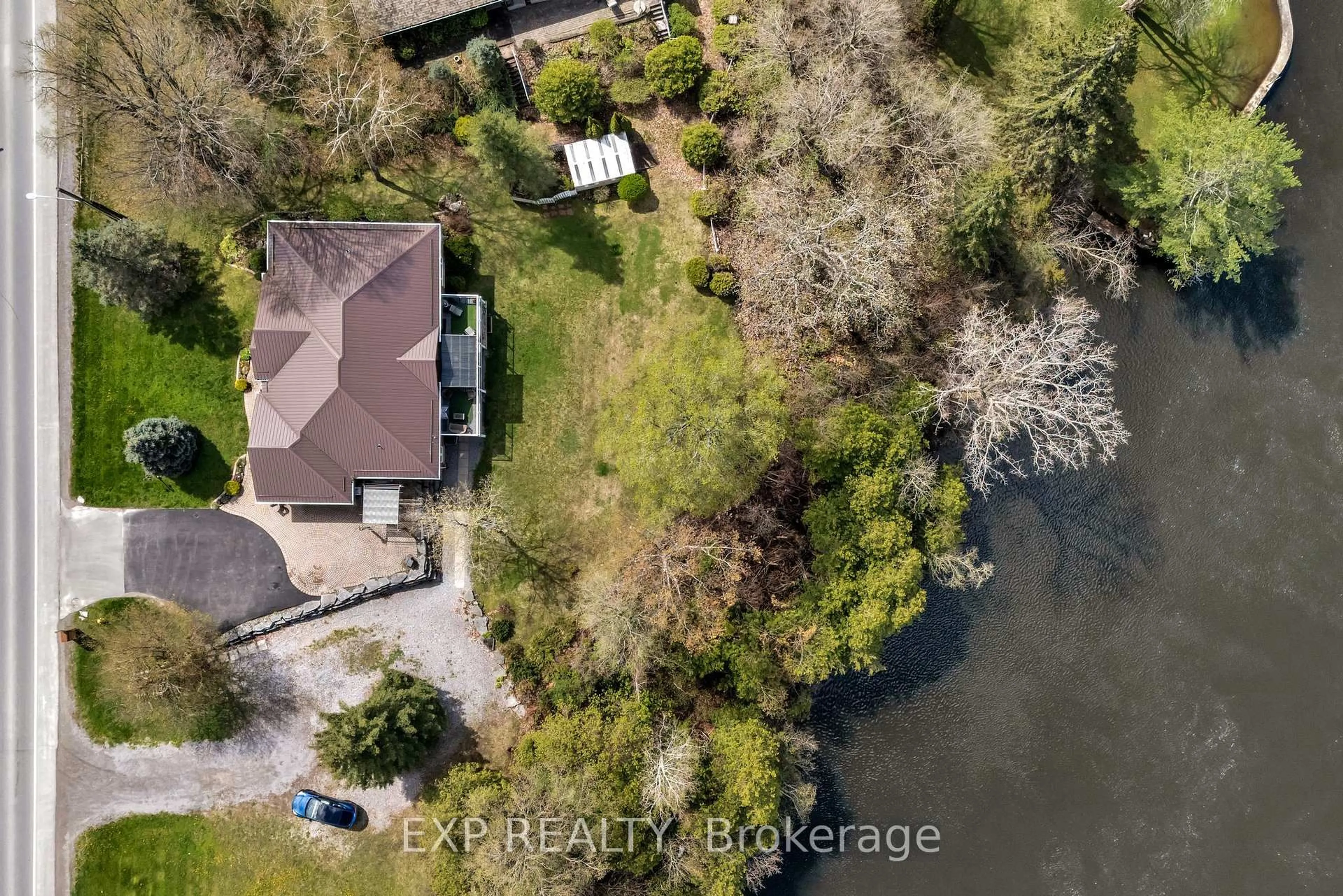 A pic from outside/outdoor area/front of a property/back of a property/a pic from drone, water/lake/river/ocean view for 127 River Dr, Hastings Ontario K0K 2C0