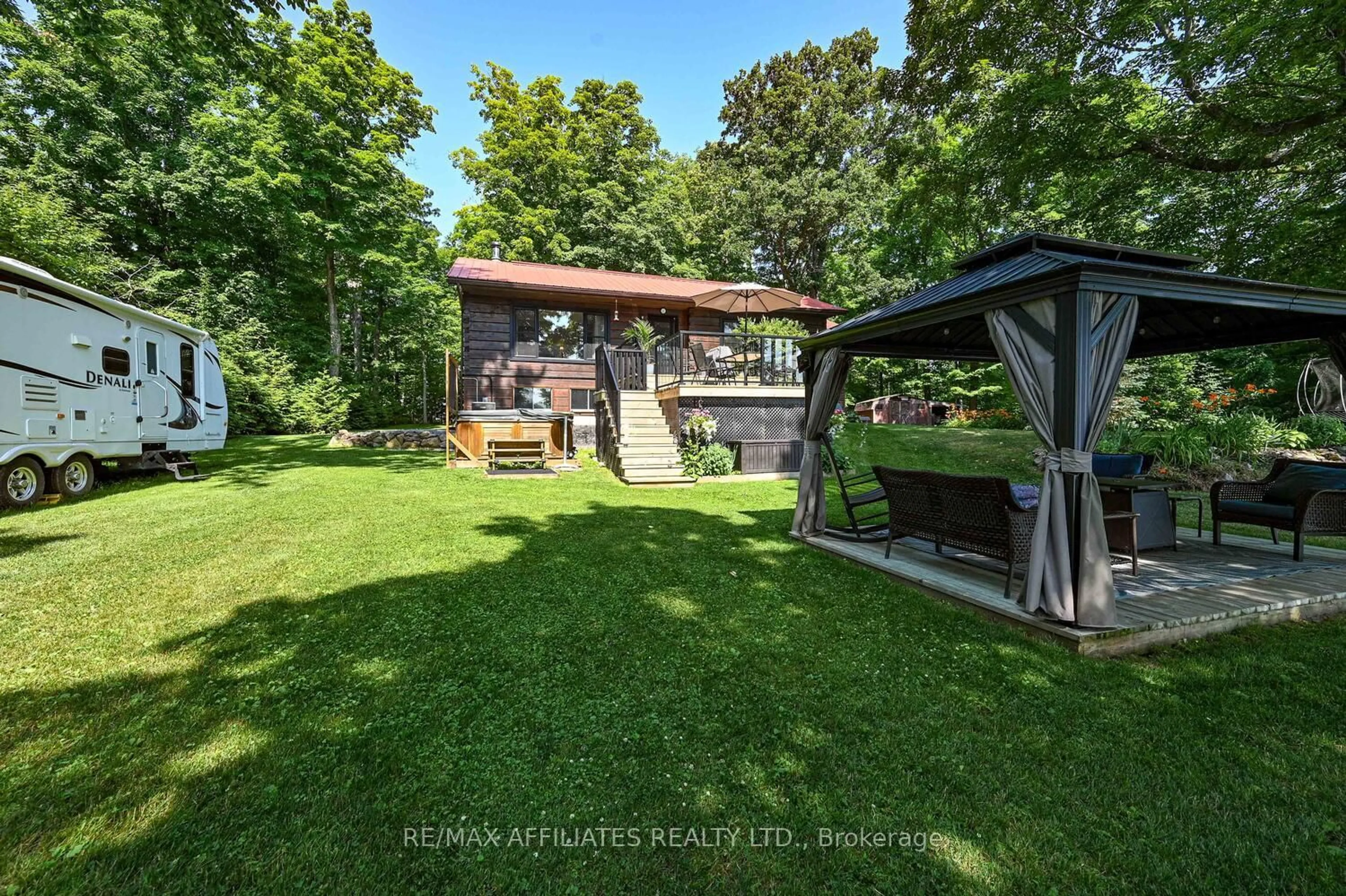 A pic from outside/outdoor area/front of a property/back of a property/a pic from drone, forest/trees view for 133 Sugarhouse Lane, Rideau Lakes Ontario K0G 1X0