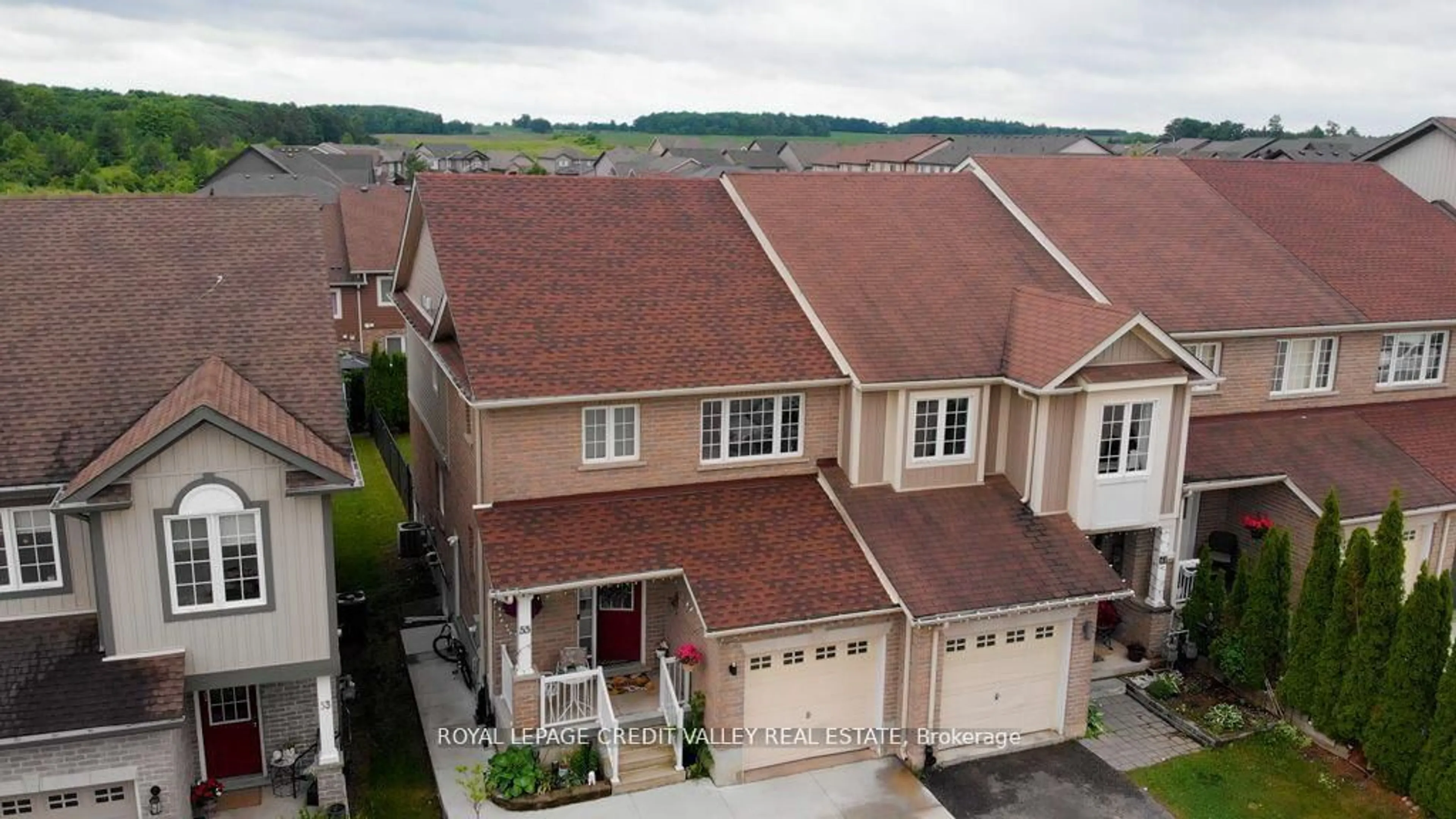 A pic from outside/outdoor area/front of a property/back of a property/a pic from drone, unknown for 55 Rockcliffe Dr, Kitchener Ontario N2R 1W5
