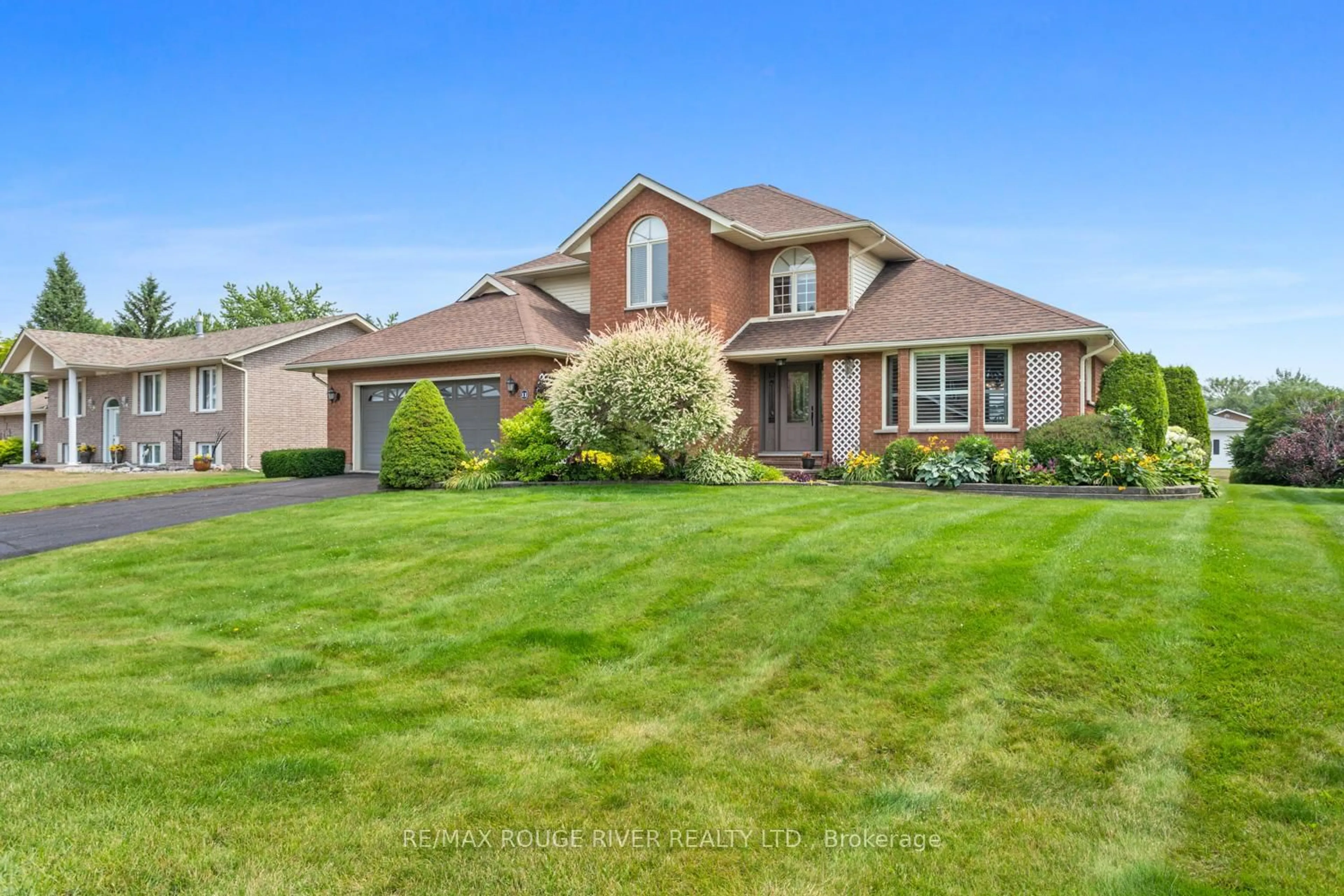Home with brick exterior material, street for 11 Rogers Rd, Brighton Ontario K0K 1H0