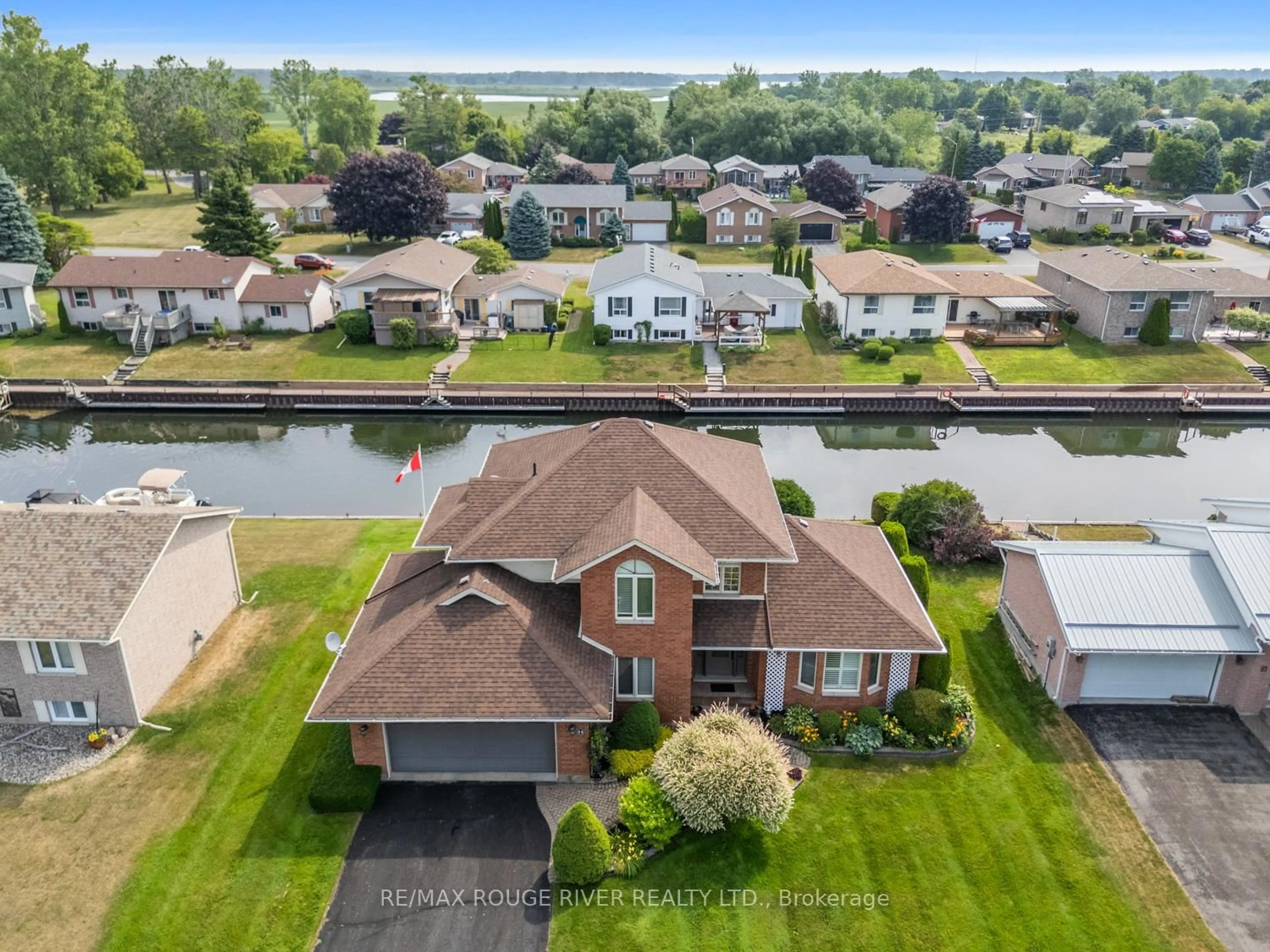 A pic from outside/outdoor area/front of a property/back of a property/a pic from drone, water/lake/river/ocean view for 11 Rogers Rd, Brighton Ontario K0K 1H0