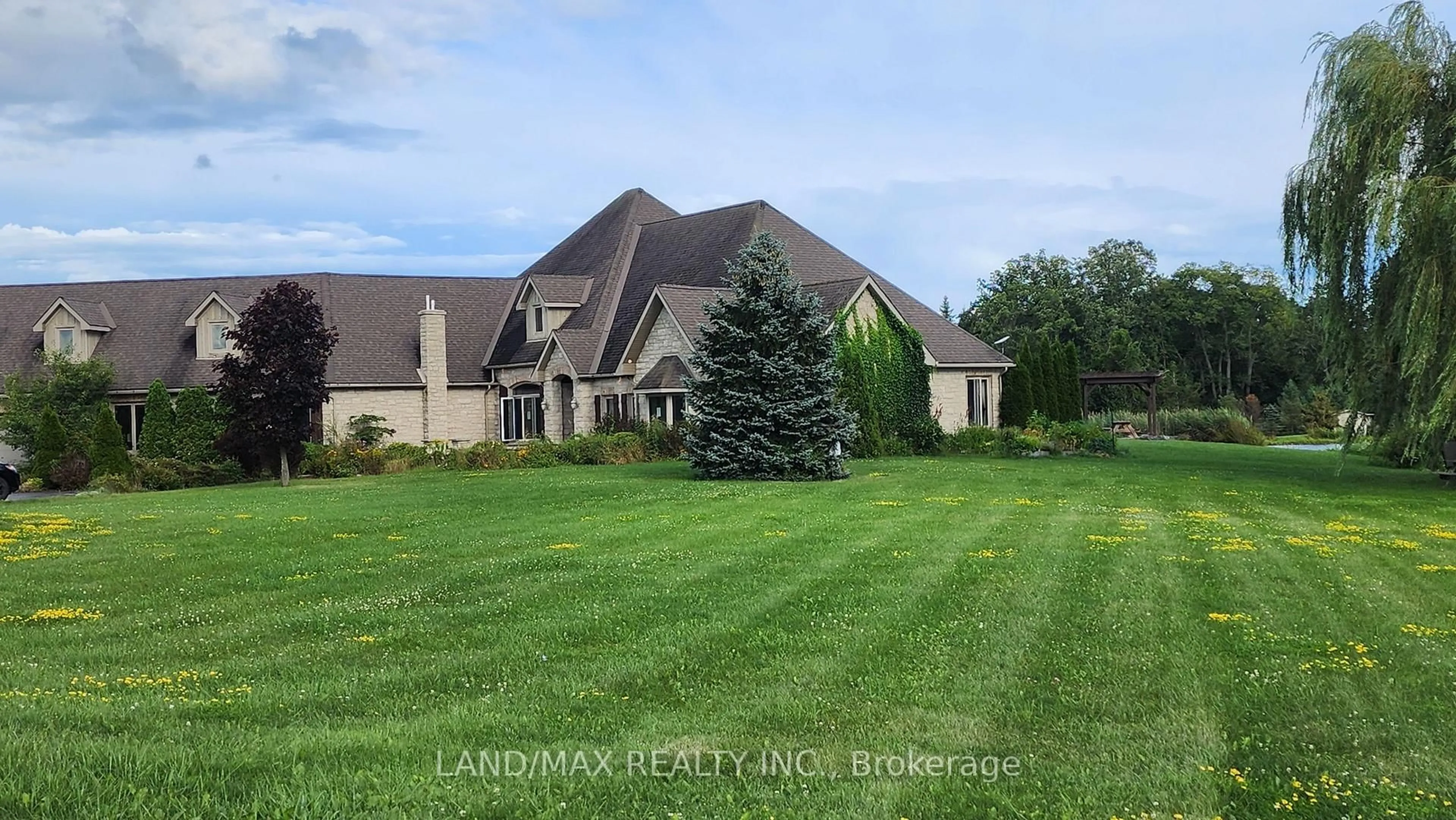 A pic from outside/outdoor area/front of a property/back of a property/a pic from drone, mountain view for 1632 County Rd, Plantagenet Ontario K7R 3L2