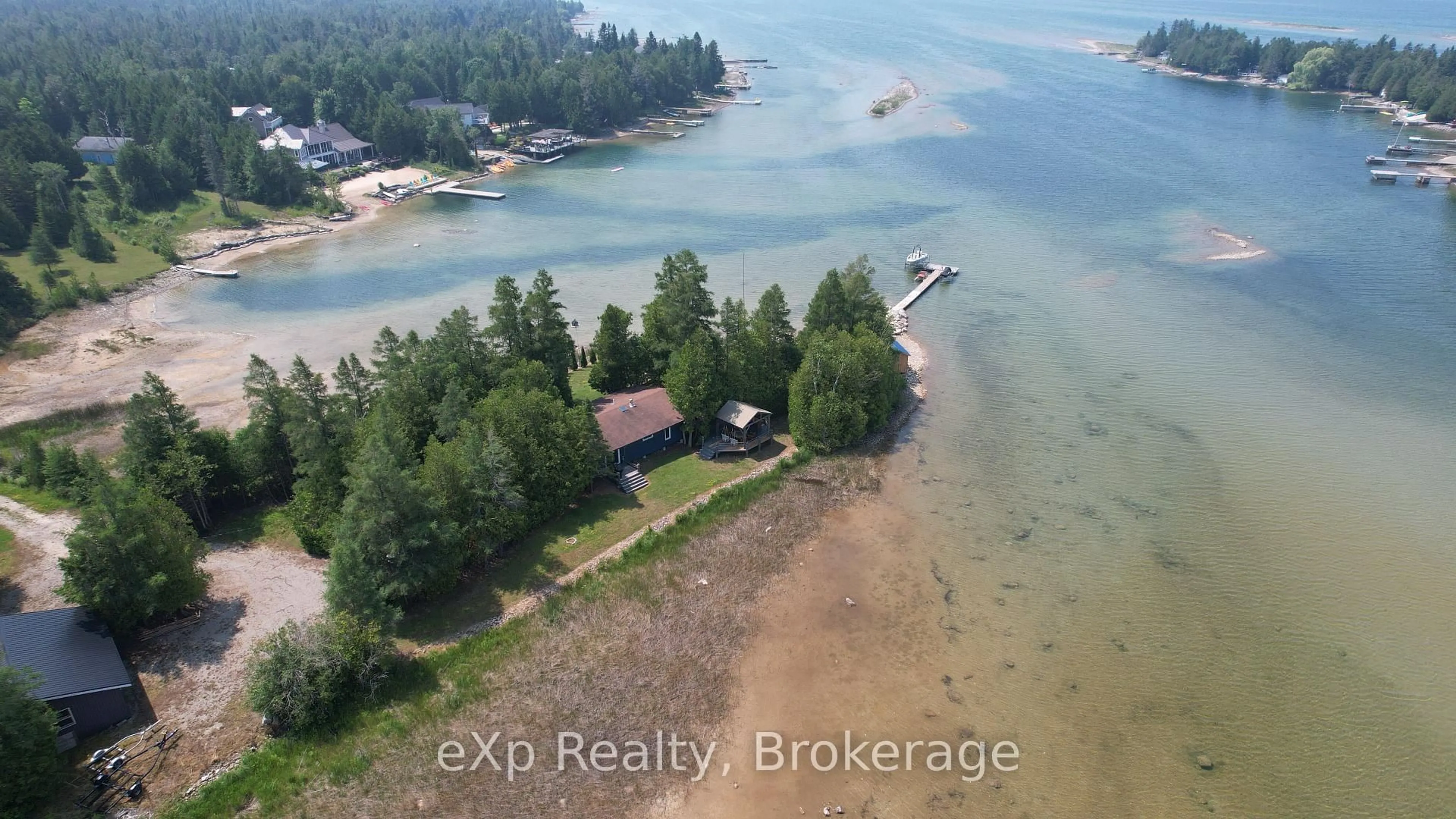 A pic from outside/outdoor area/front of a property/back of a property/a pic from drone, water/lake/river/ocean view for 32 Doerr Dr, Northern Bruce Peninsula Ontario N0H 1W0