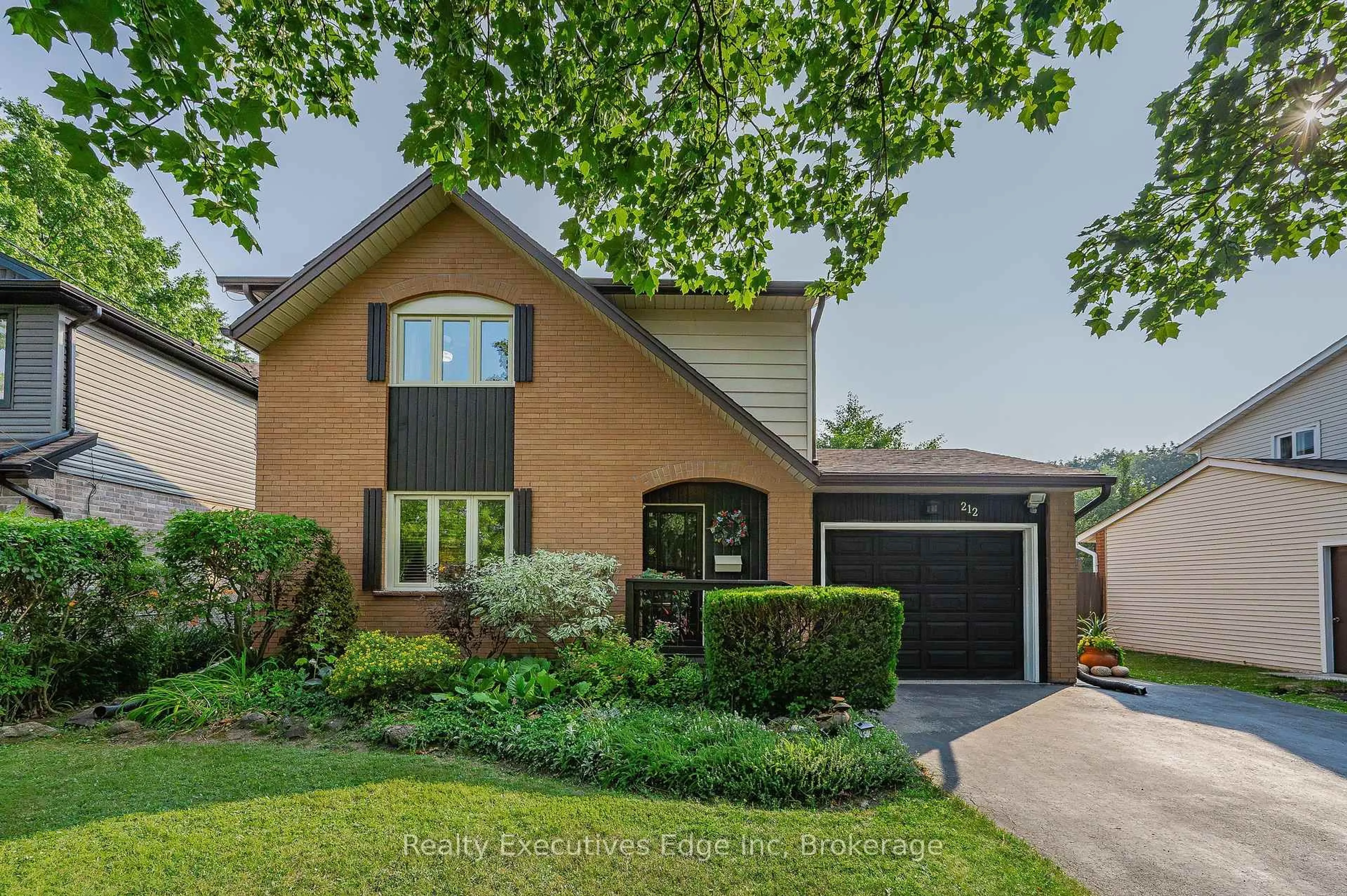 Home with brick exterior material, street for 212 Edinburgh Rd, Guelph Ontario N1H 5R9