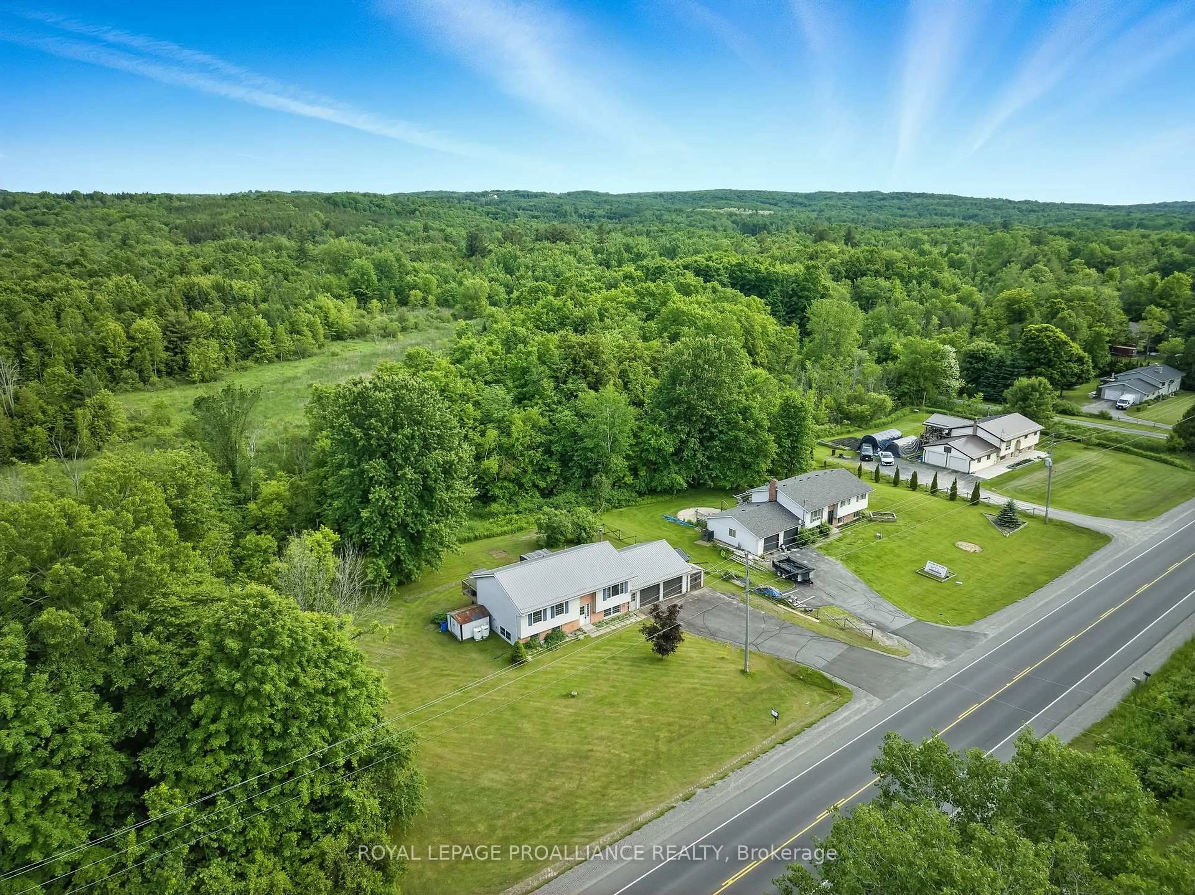 A pic from outside/outdoor area/front of a property/back of a property/a pic from drone, forest/trees view for 275 County Rd 41 Rd, Brighton Ontario K0K 1R0
