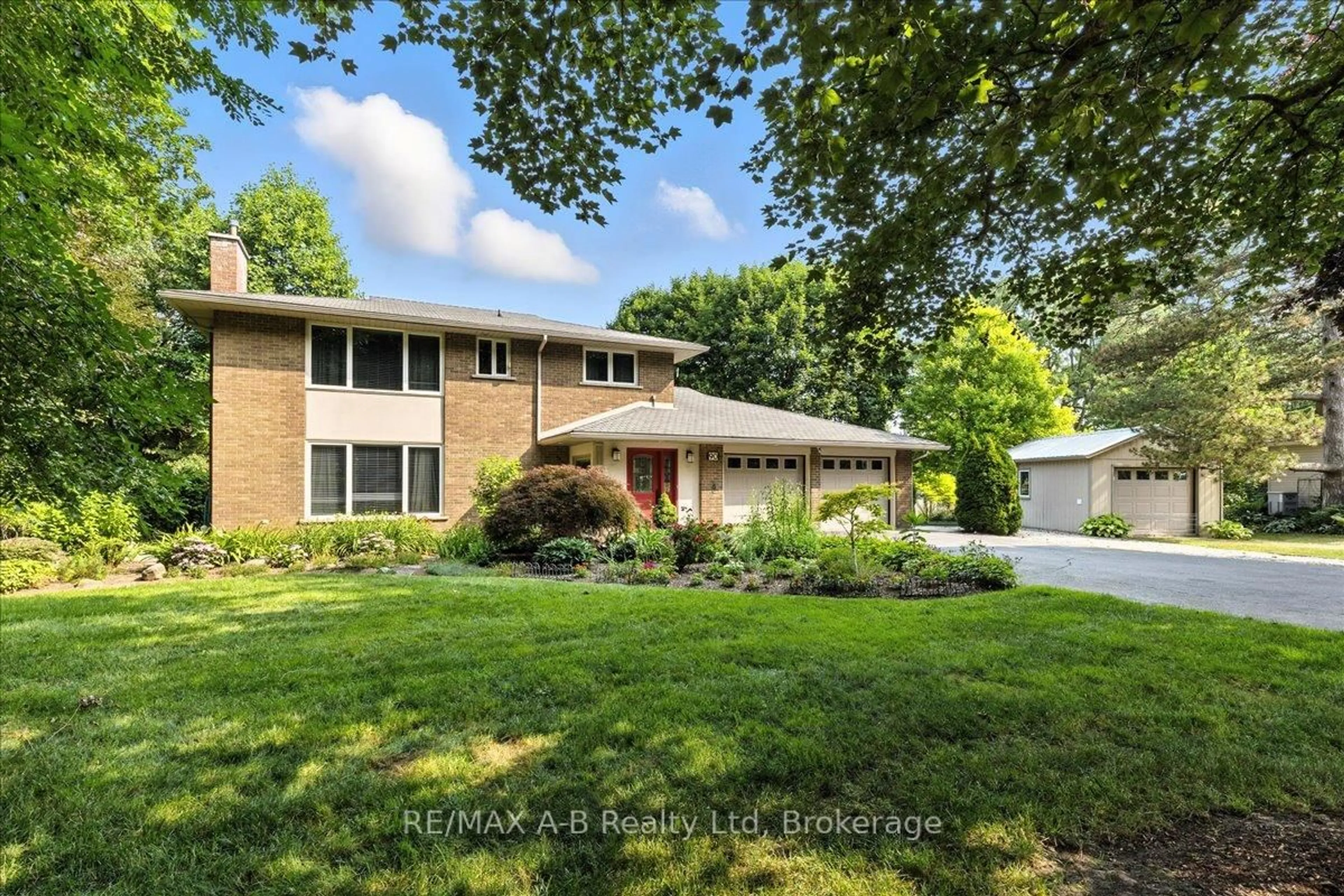 Home with brick exterior material, street for 90 Delamere Ave, Stratford Ontario N5A 4Z5