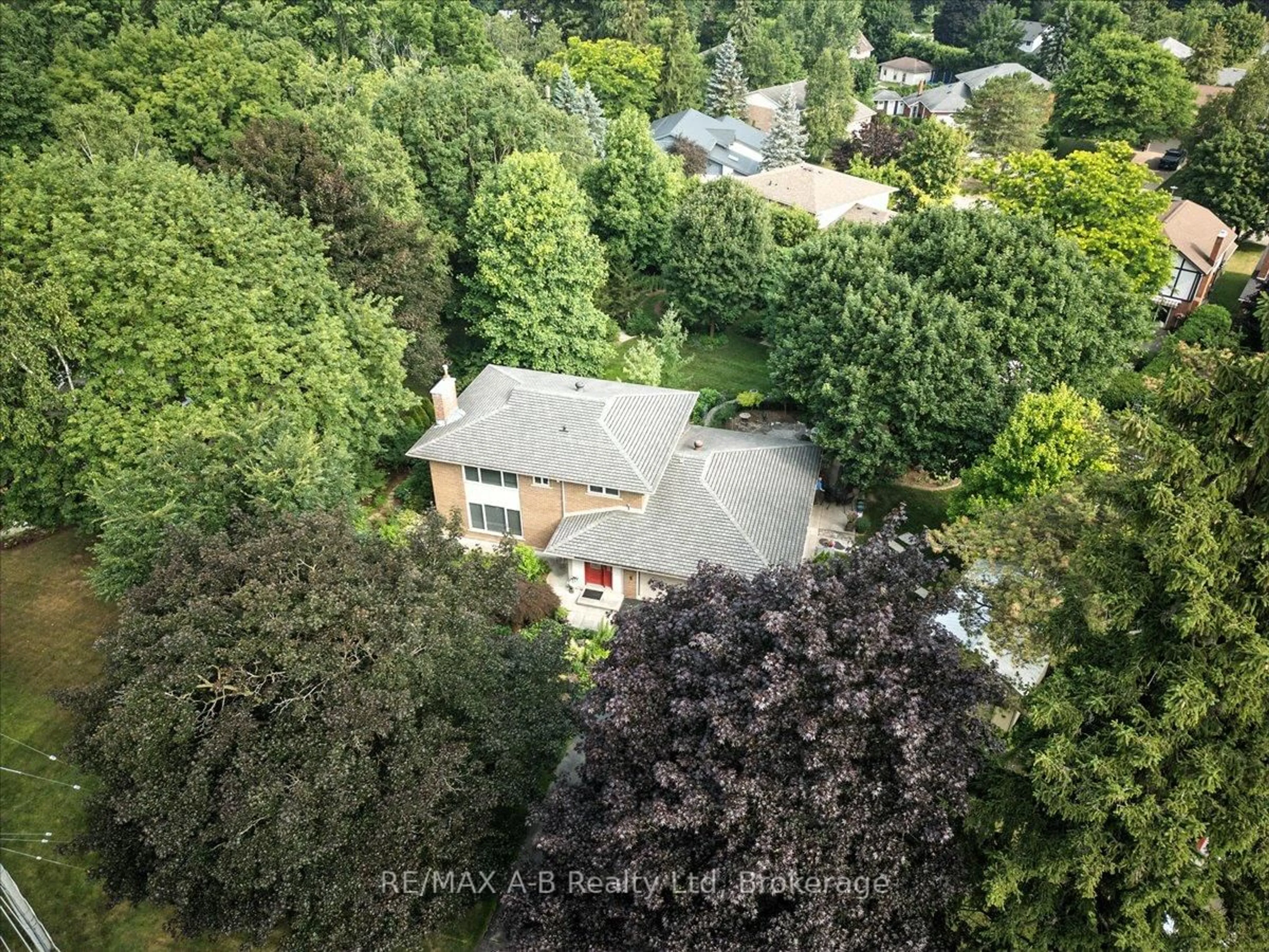 A pic from outside/outdoor area/front of a property/back of a property/a pic from drone, forest/trees view for 90 Delamere Ave, Stratford Ontario N5A 4Z5