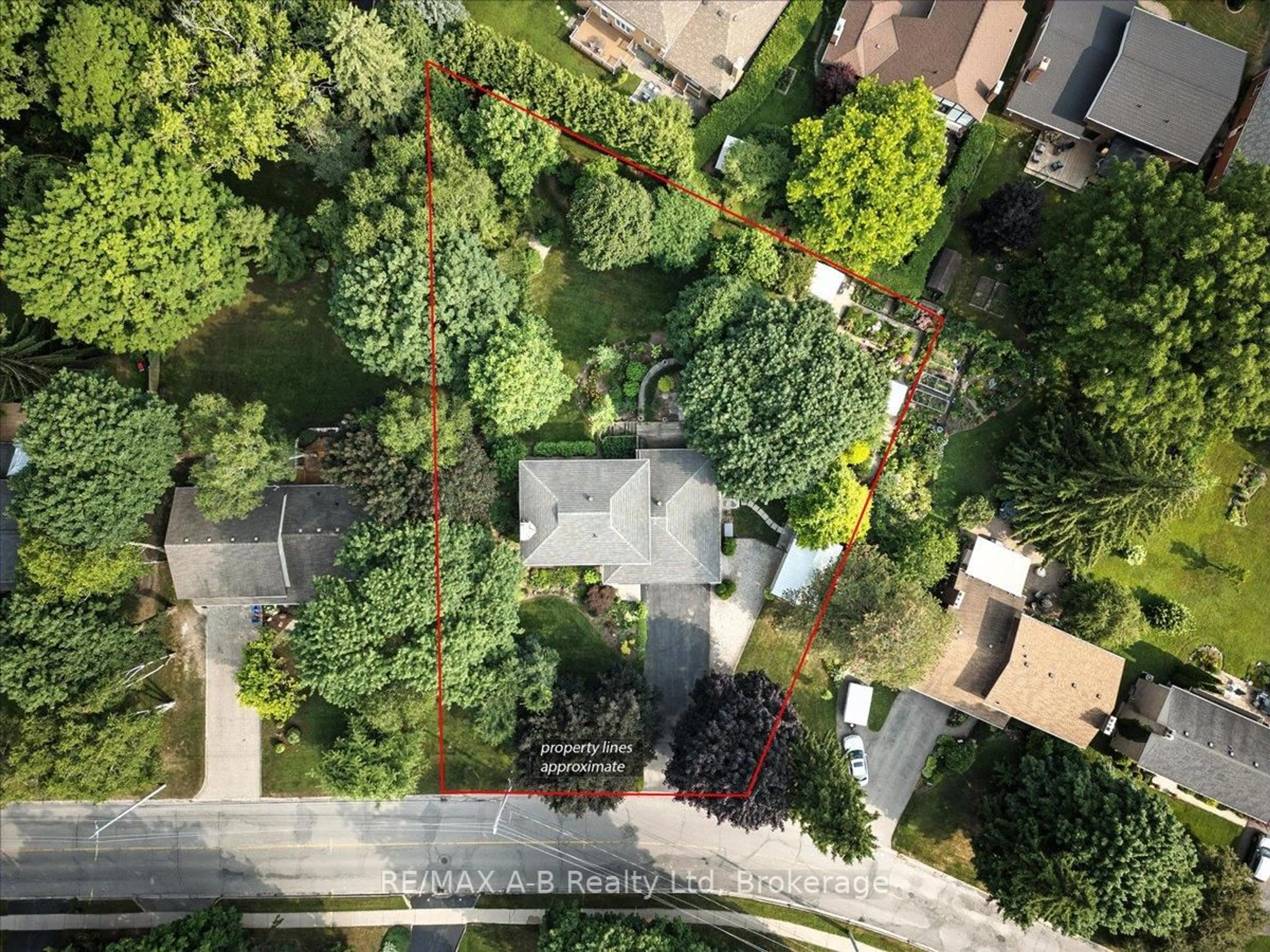 A pic from outside/outdoor area/front of a property/back of a property/a pic from drone, forest/trees view for 90 Delamere Ave, Stratford Ontario N5A 4Z5
