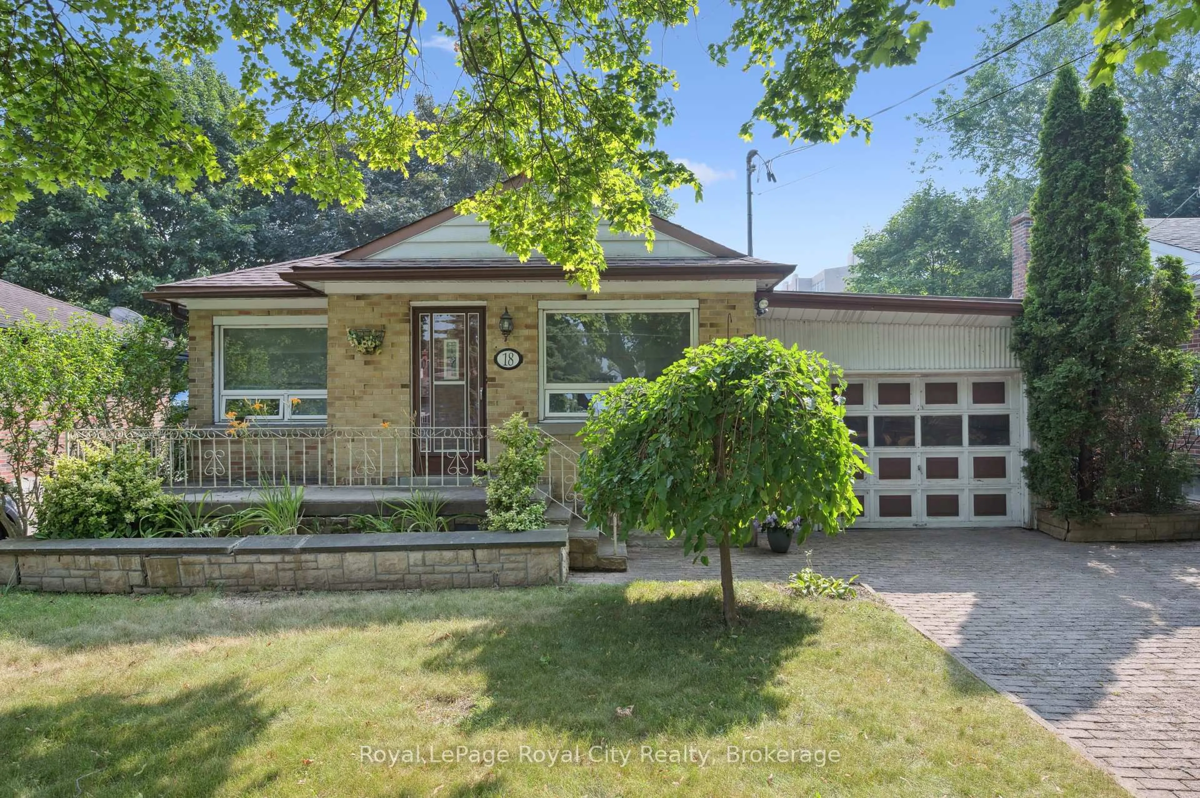 Home with brick exterior material, street for 18 Skov Cres, Guelph Ontario N1E 4B7