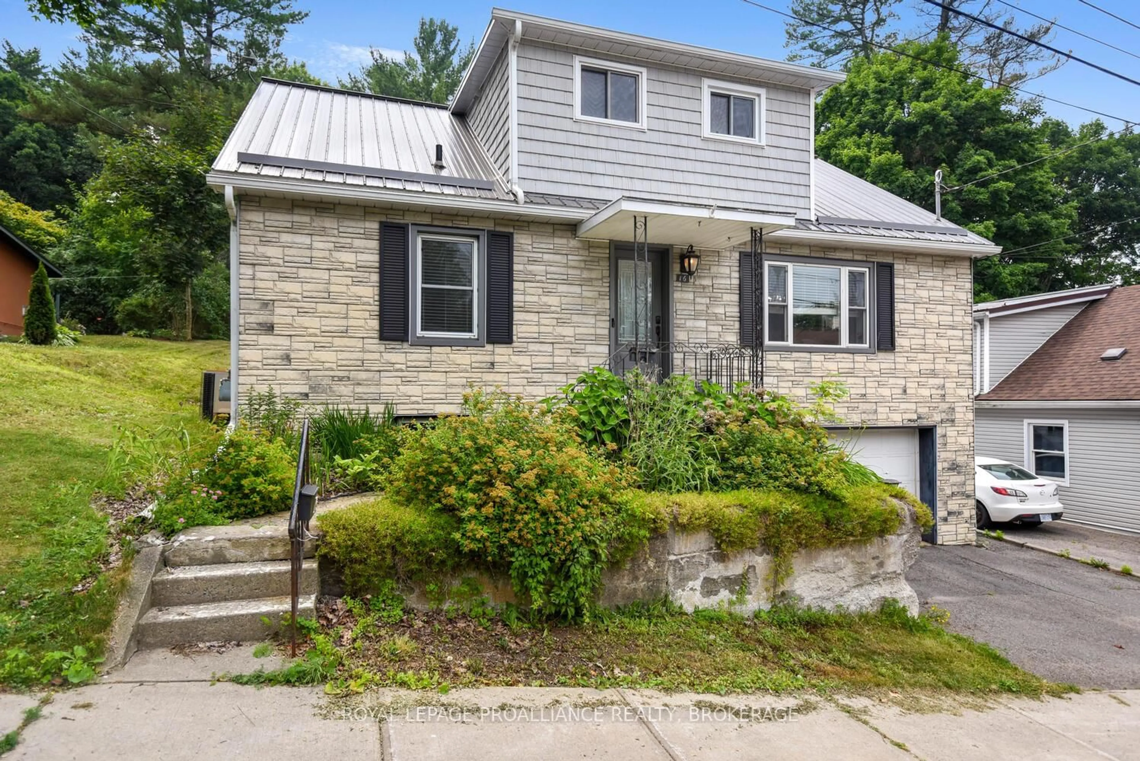 Home with vinyl exterior material, street for 16 Mccready St, Brockville Ontario K6V 5N3