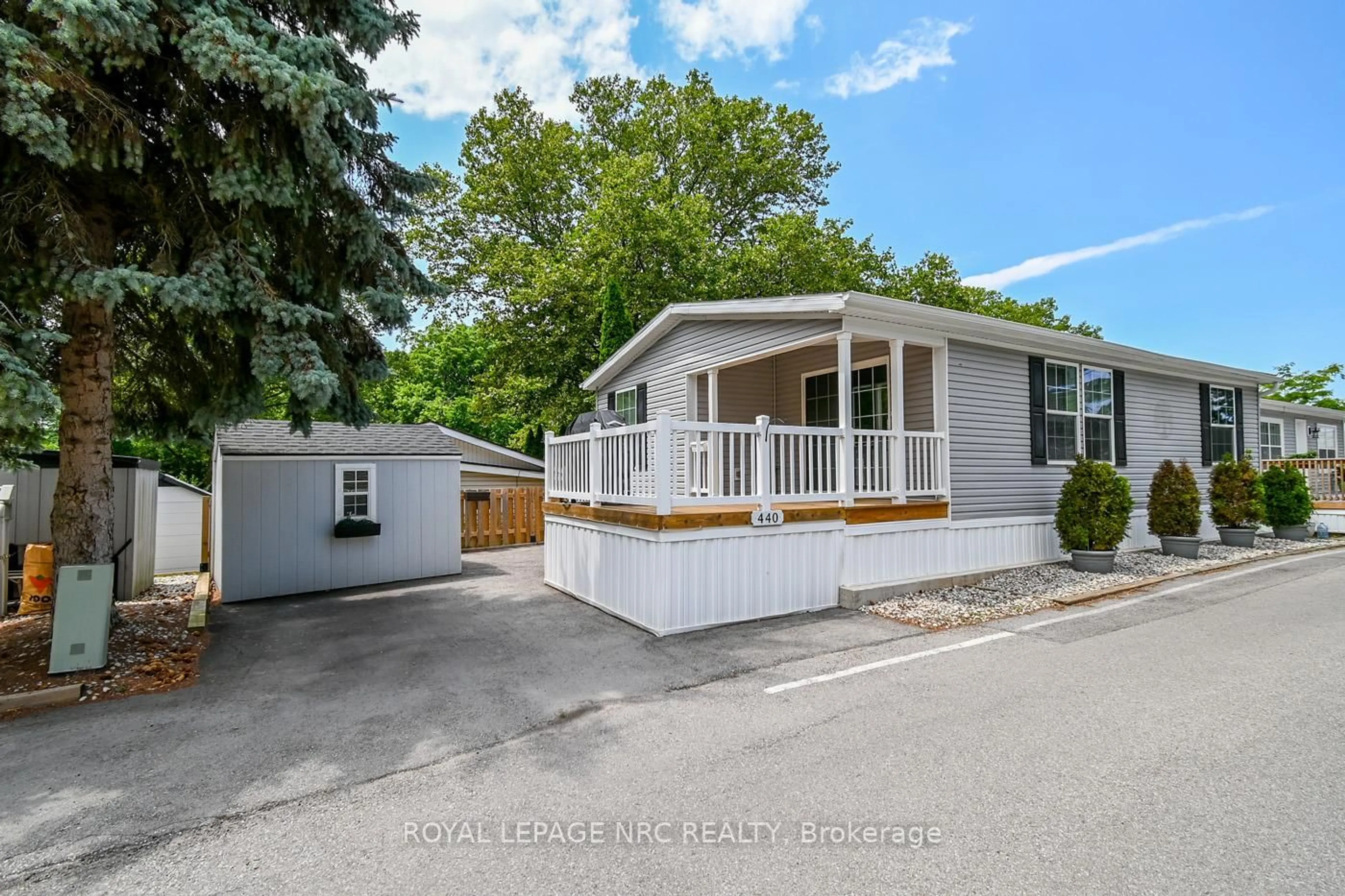 Home with vinyl exterior material, street for 23 Four Mile Creek Rd #440, Niagara-on-the-Lake Ontario L0S 1J1