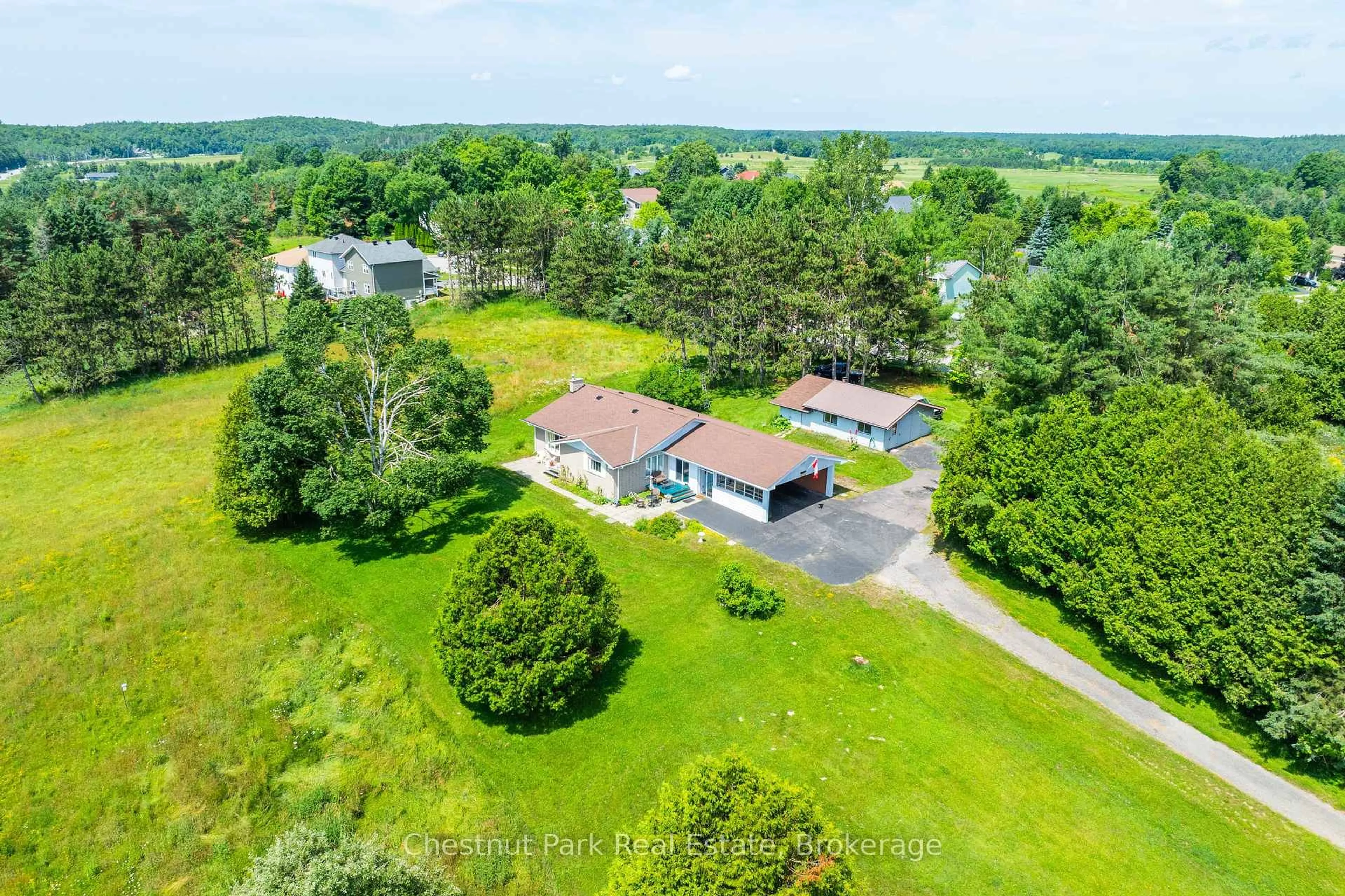 A pic from outside/outdoor area/front of a property/back of a property/a pic from drone, unknown for 8 Dandelion Lane, Bracebridge Ontario P1L 1W8