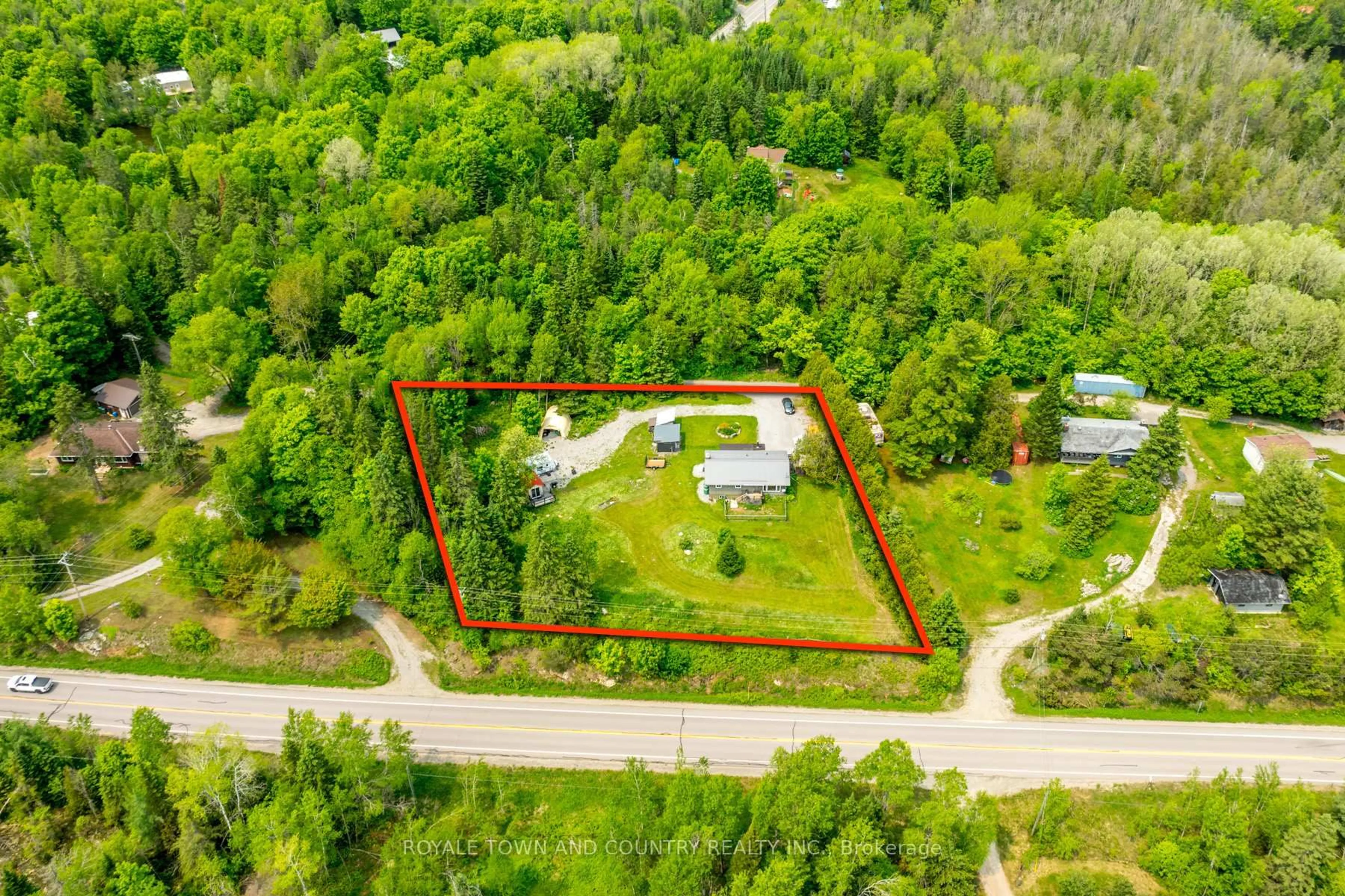 A pic from outside/outdoor area/front of a property/back of a property/a pic from drone, unknown for 1042 Tweed Dr, Highlands East Ontario K0M 1R0