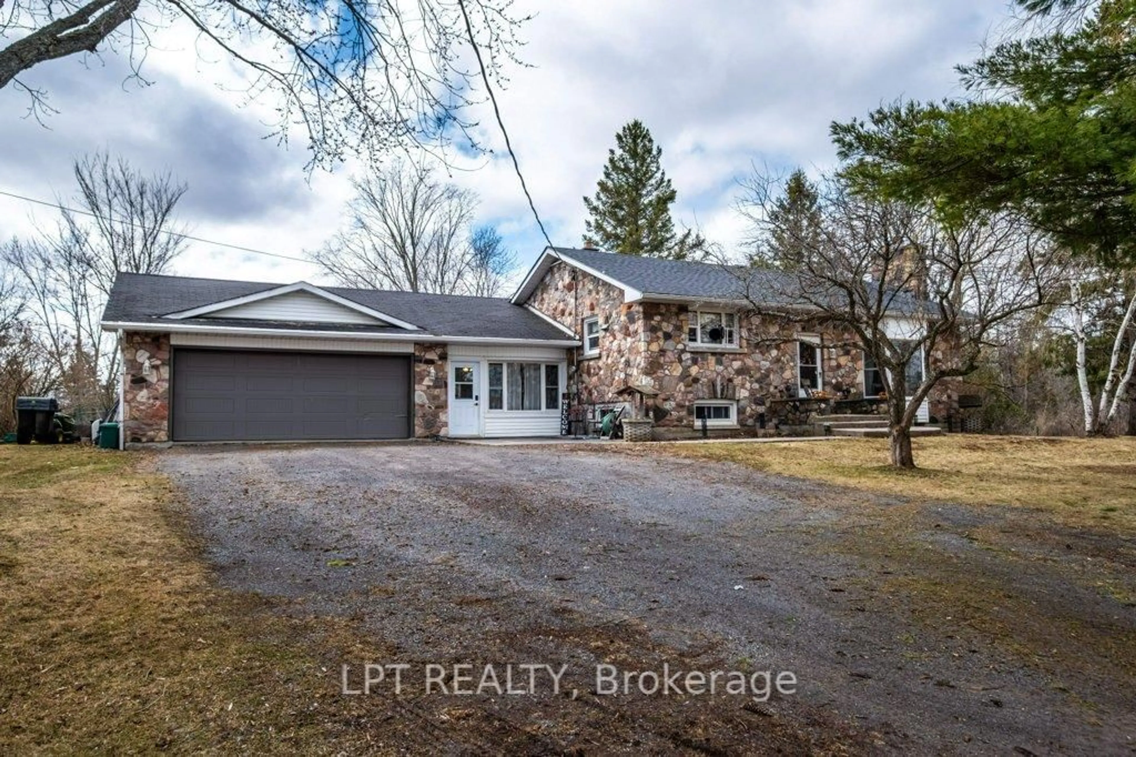 A pic from outside/outdoor area/front of a property/back of a property/a pic from drone, street for 3939 Howes Rd, Bissett Creek Ontario K0H 2H0