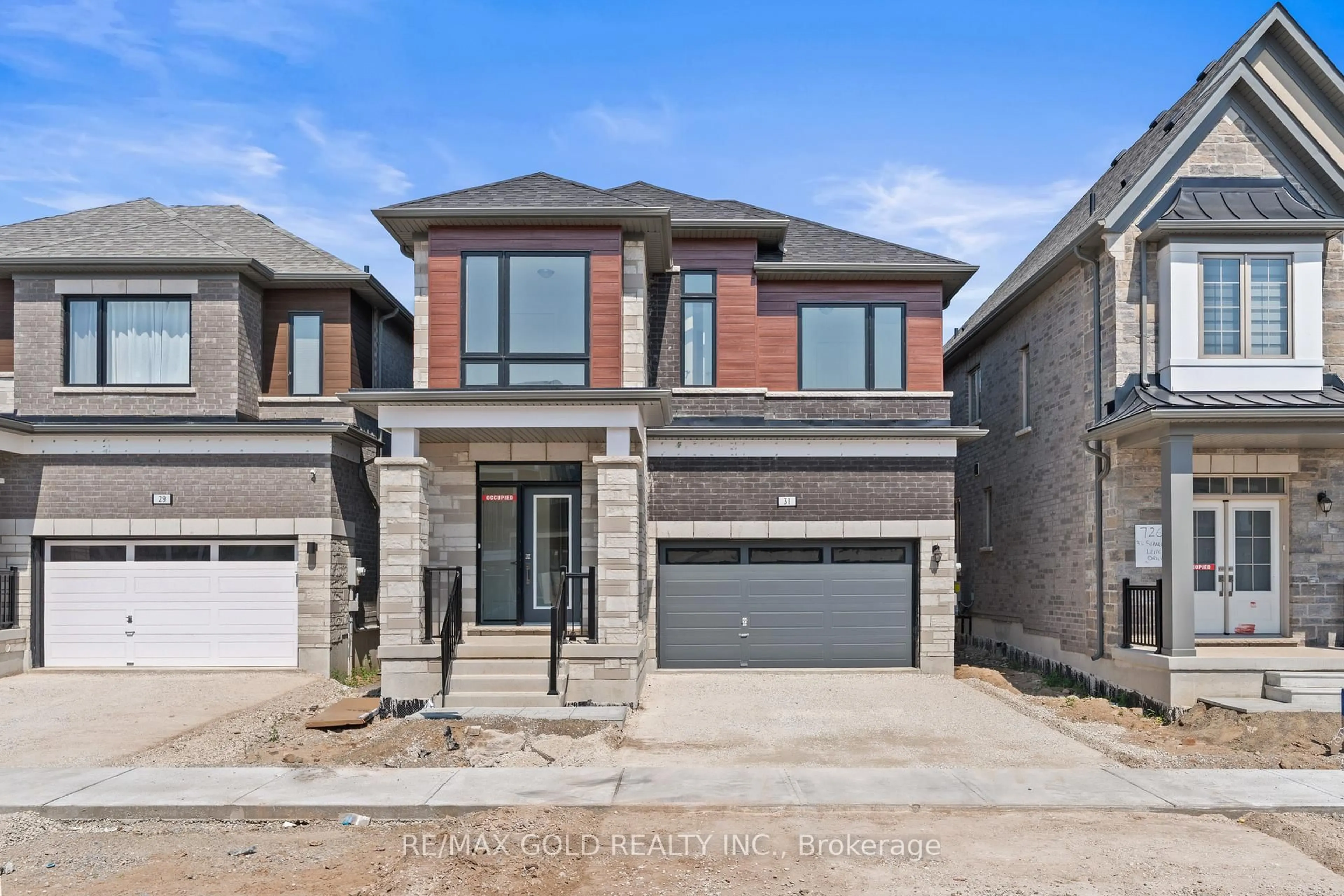 Home with brick exterior material, street for 31 Stanley Leitch Dr, Erin Ontario N0B 1T0