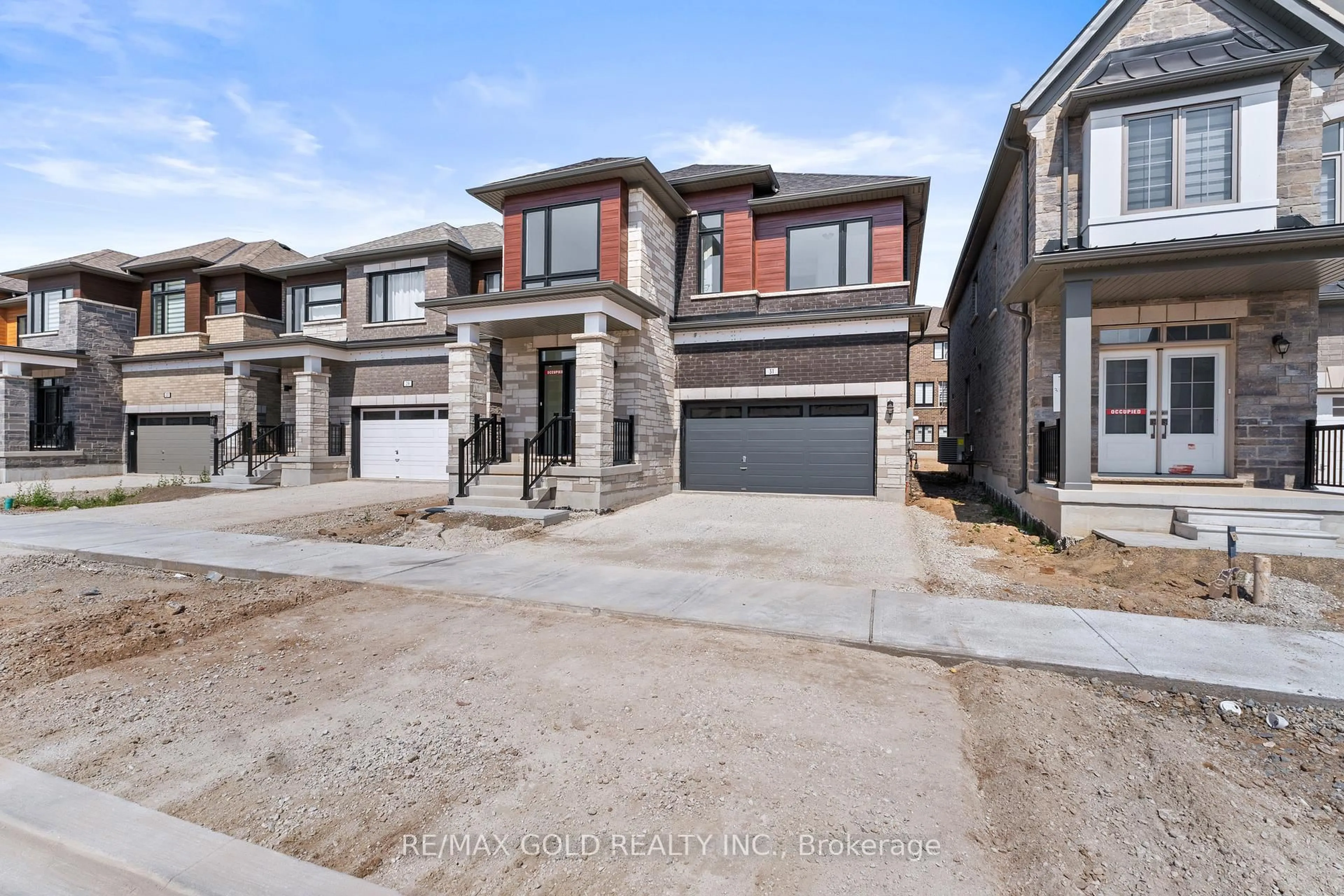 Home with brick exterior material, street for 31 Stanley Leitch Dr, Erin Ontario N0B 1T0