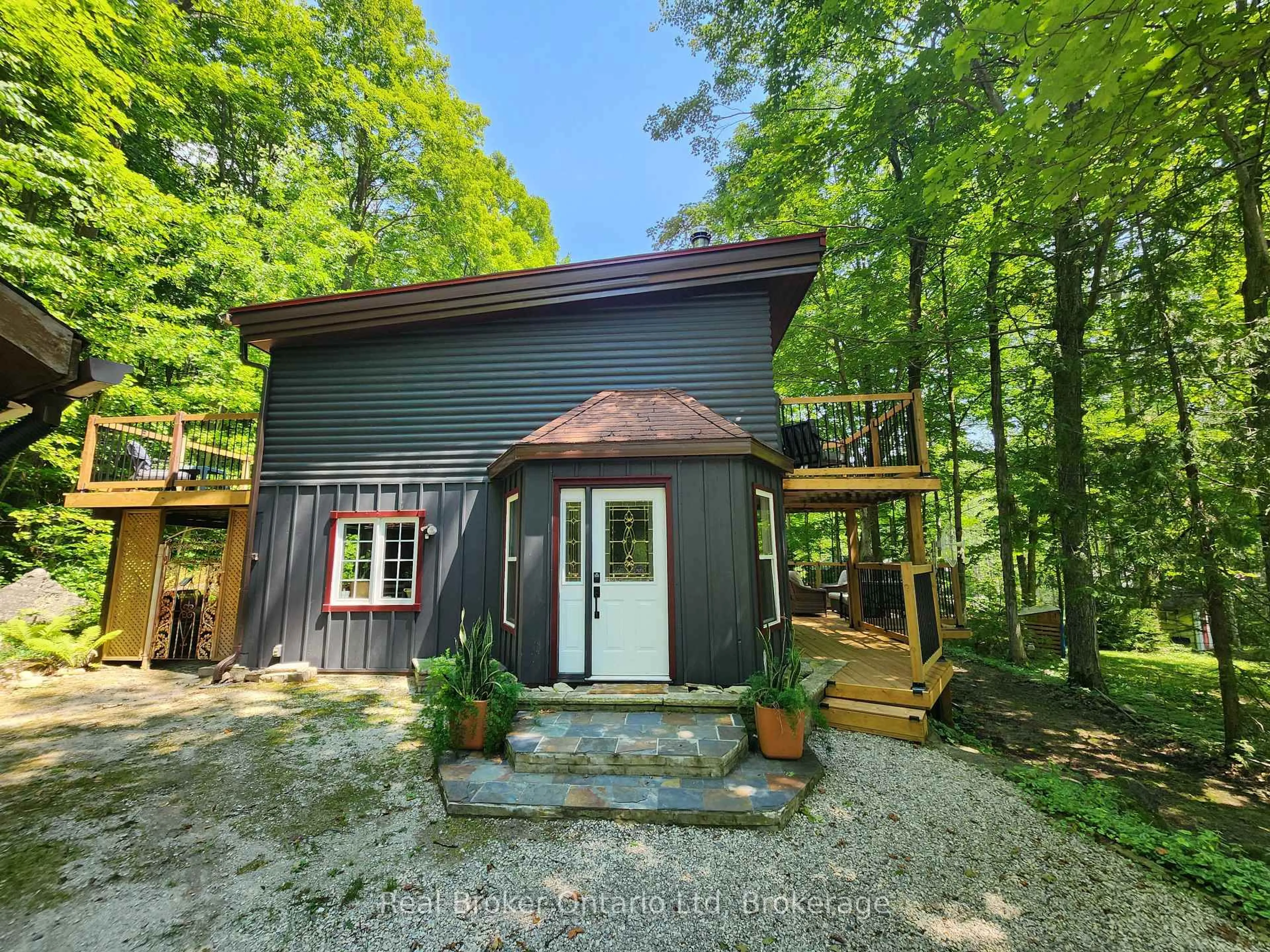 A pic from outside/outdoor area/front of a property/back of a property/a pic from drone, forest/trees view for 12 7th Ave, South Bruce Peninsula Ontario N0H 2T0