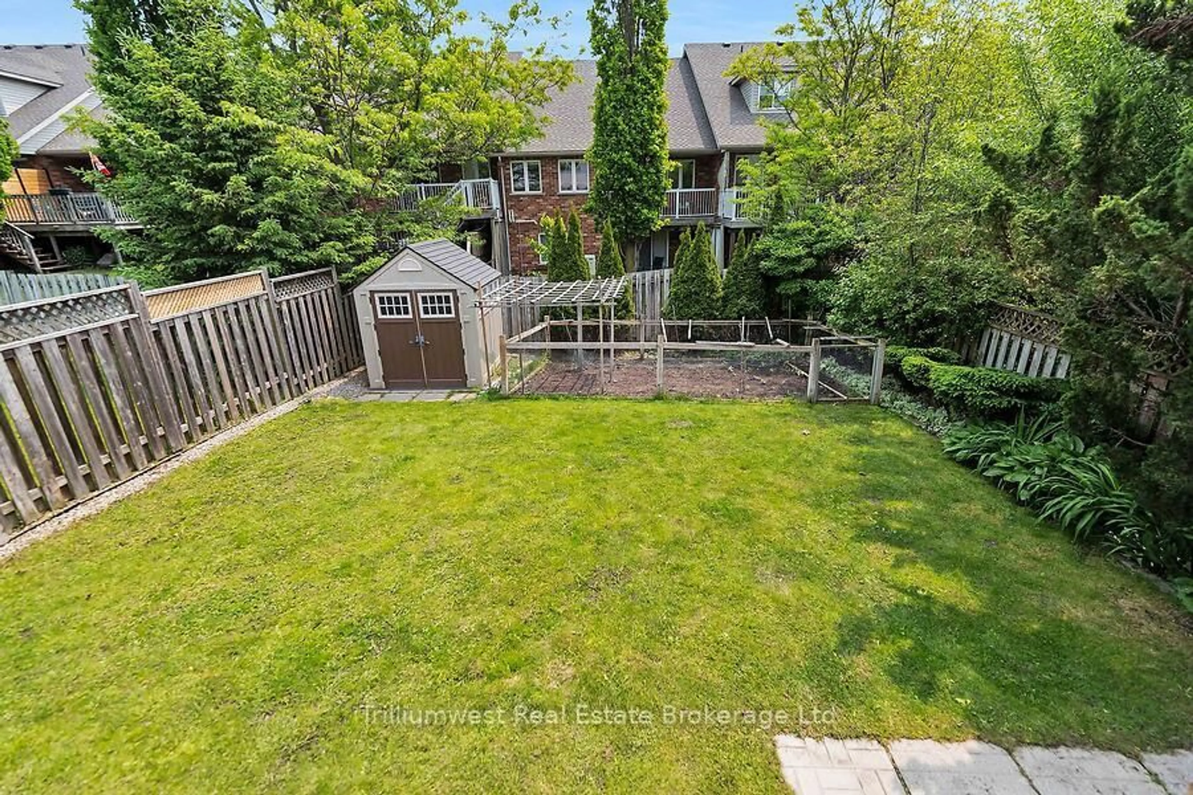 A pic from outside/outdoor area/front of a property/back of a property/a pic from drone, unknown for 105 Southcreek Tr, Guelph Ontario N1G 5A7