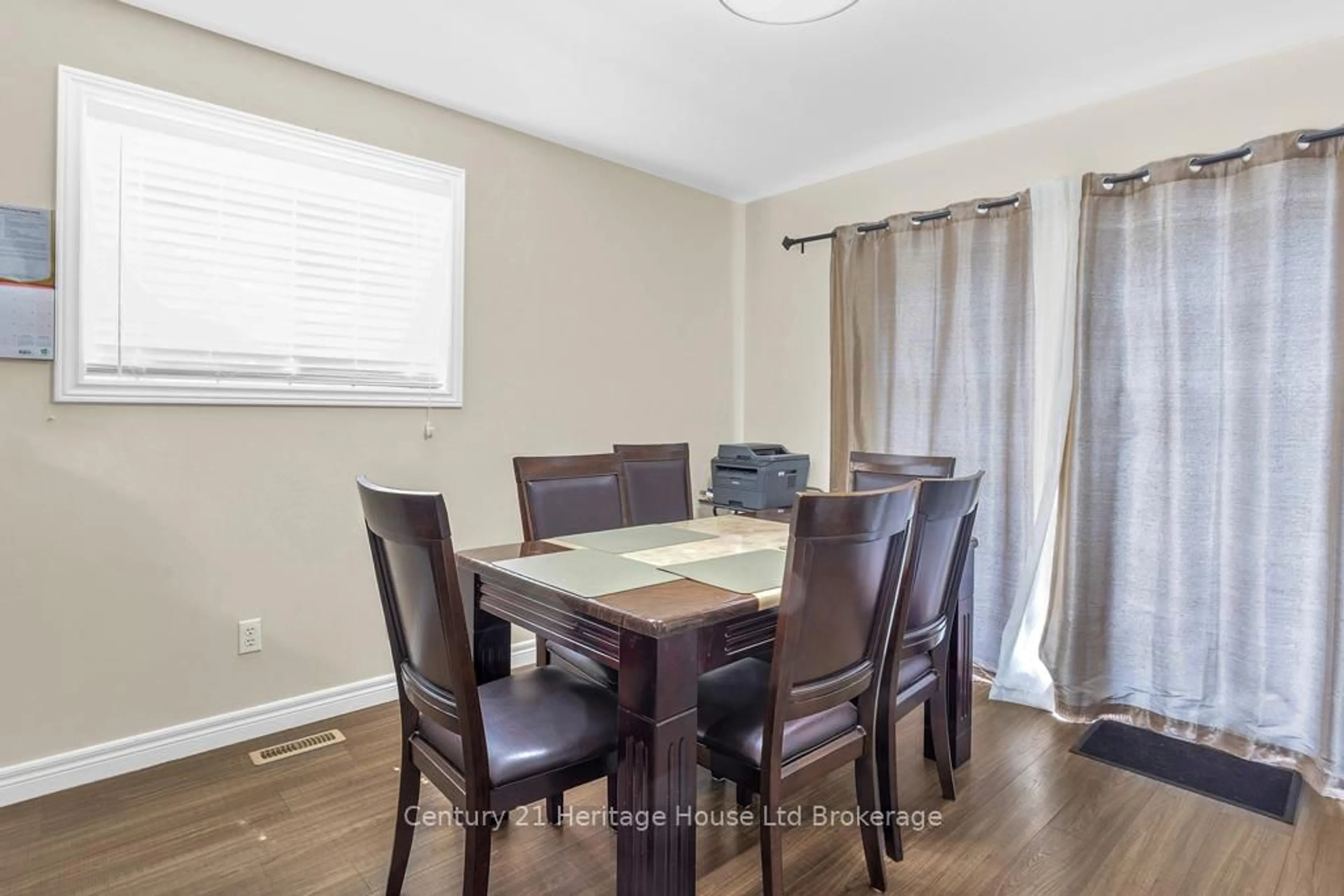 Dining room, wood/laminate floor for 51 Barker St, Tillsonburg Ontario N4G 5N7