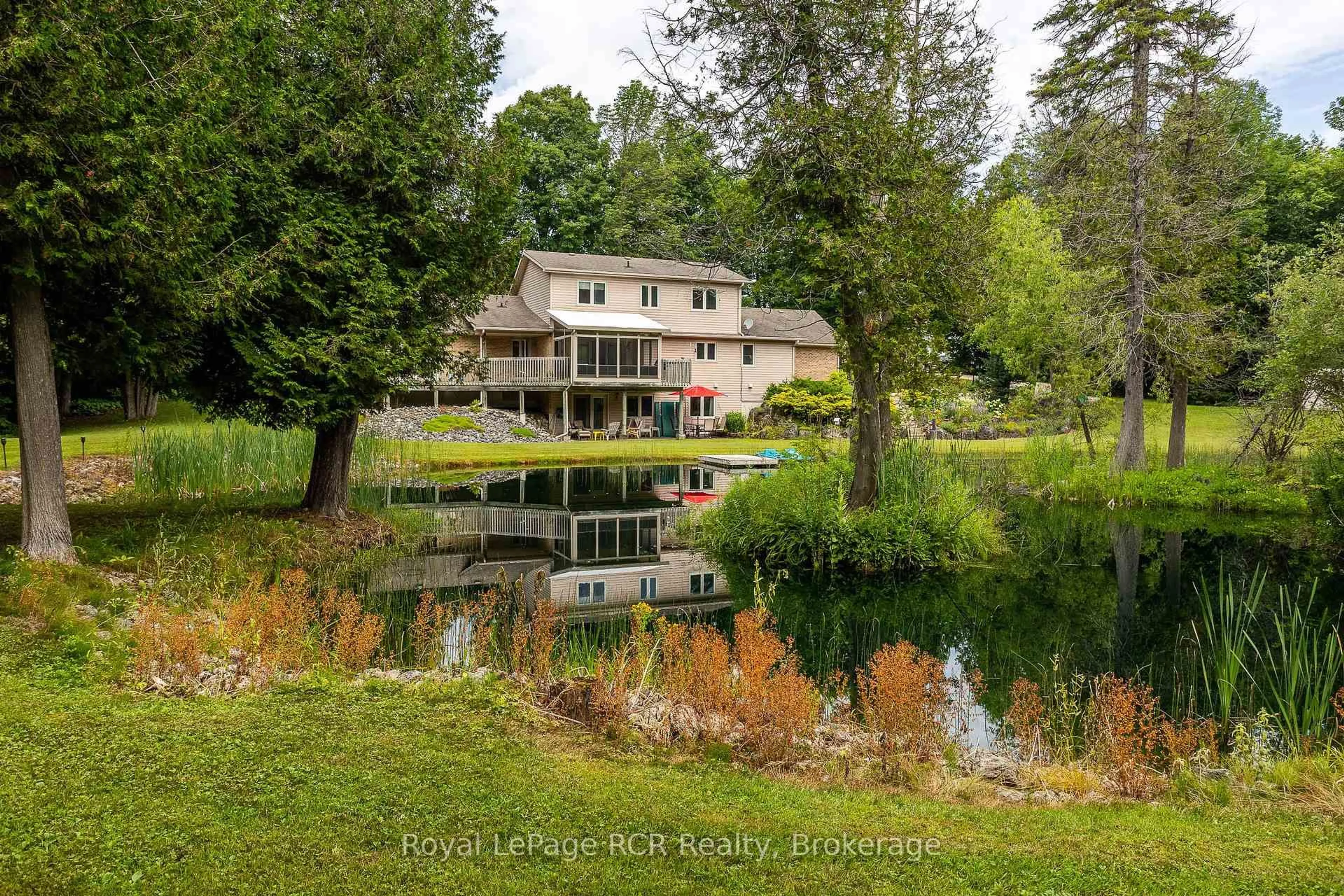 A pic from outside/outdoor area/front of a property/back of a property/a pic from drone, water/lake/river/ocean view for 360422 Road 160, Grey Highlands Ontario N0C 1E0