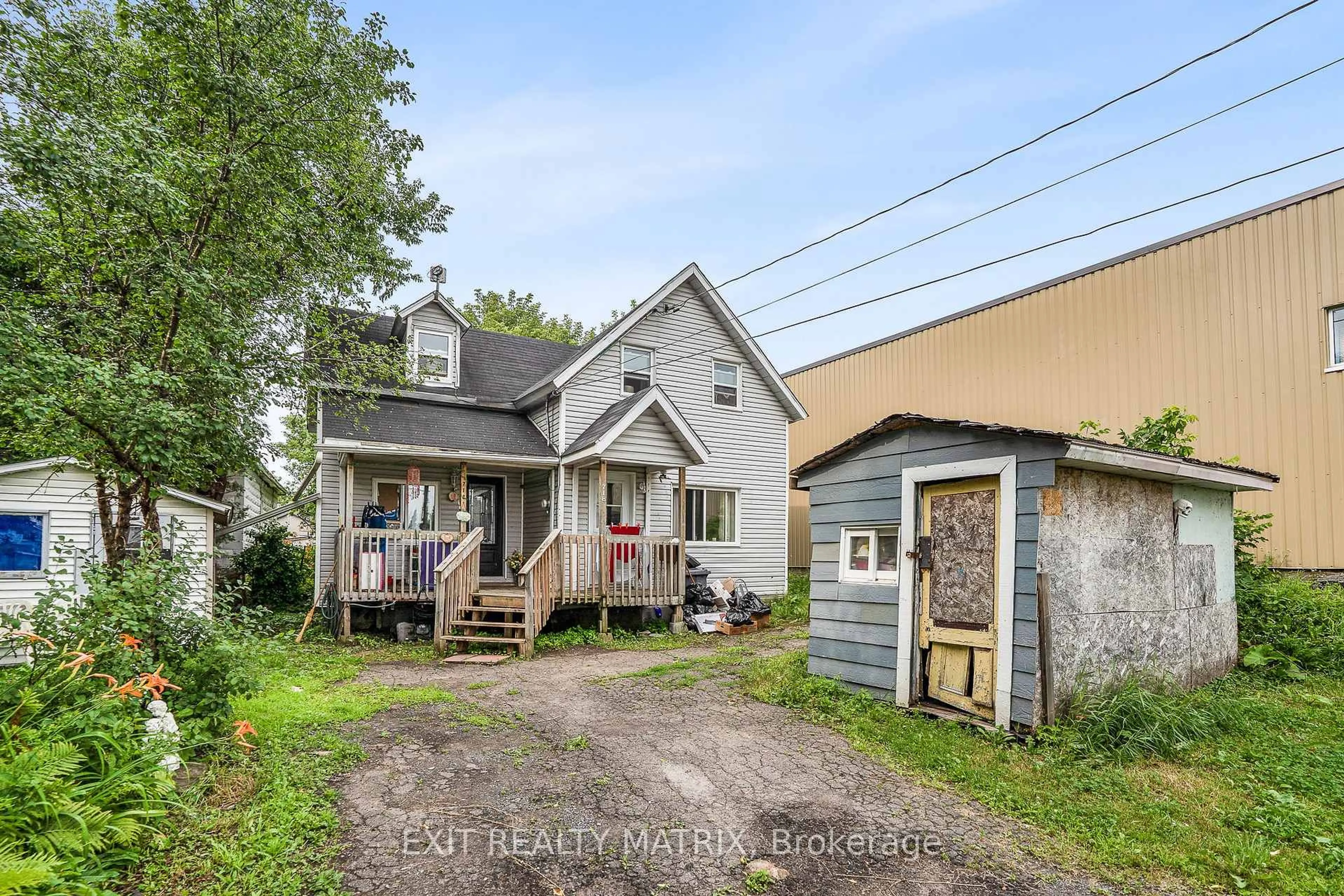 A pic from outside/outdoor area/front of a property/back of a property/a pic from drone, street for 712-718 Main St, Hawkesbury Ontario K6A 1B4
