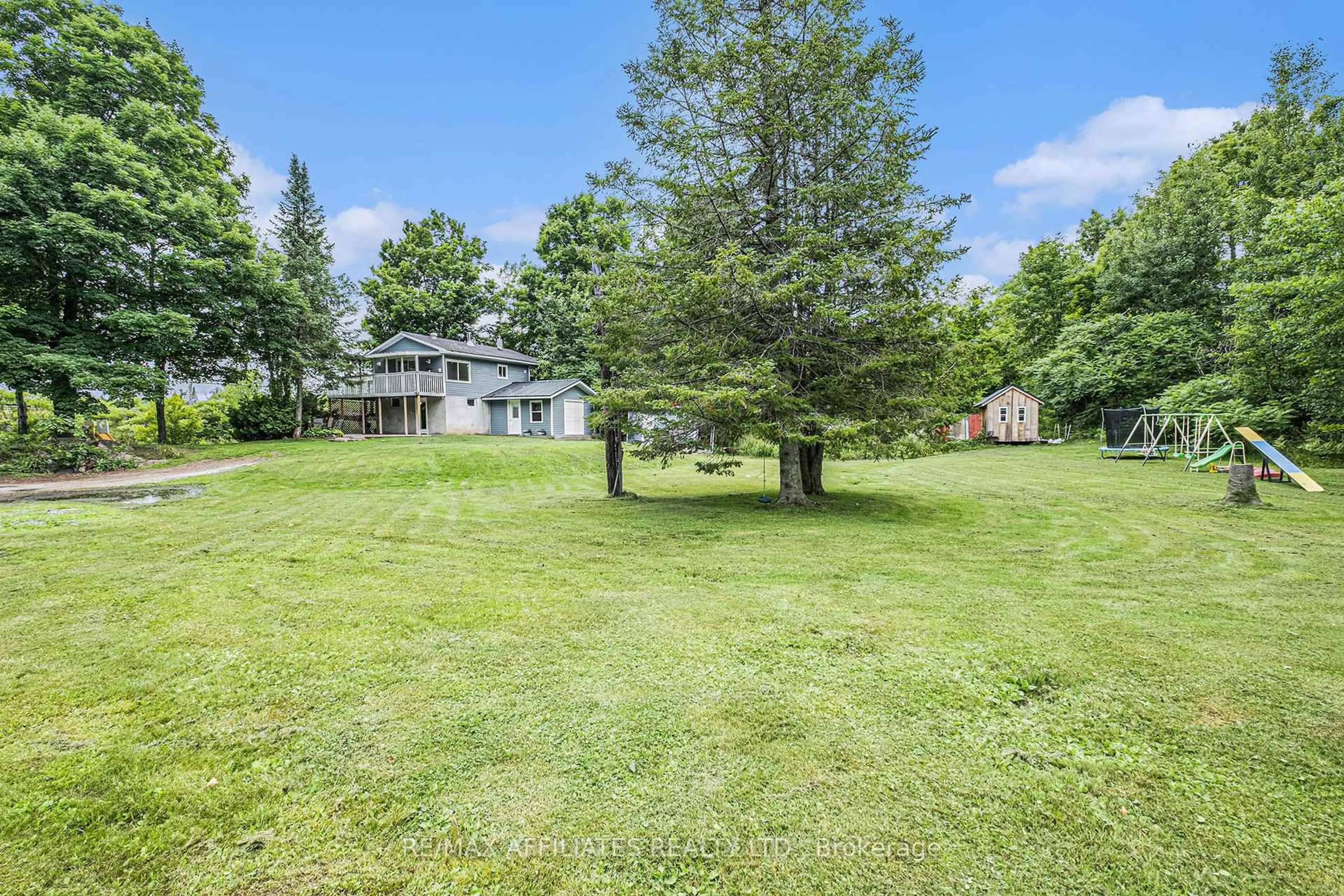 A pic from outside/outdoor area/front of a property/back of a property/a pic from drone, water/lake/river/ocean view for 13198 38 Rd, Sharbot Lake Ontario K0H 2P0