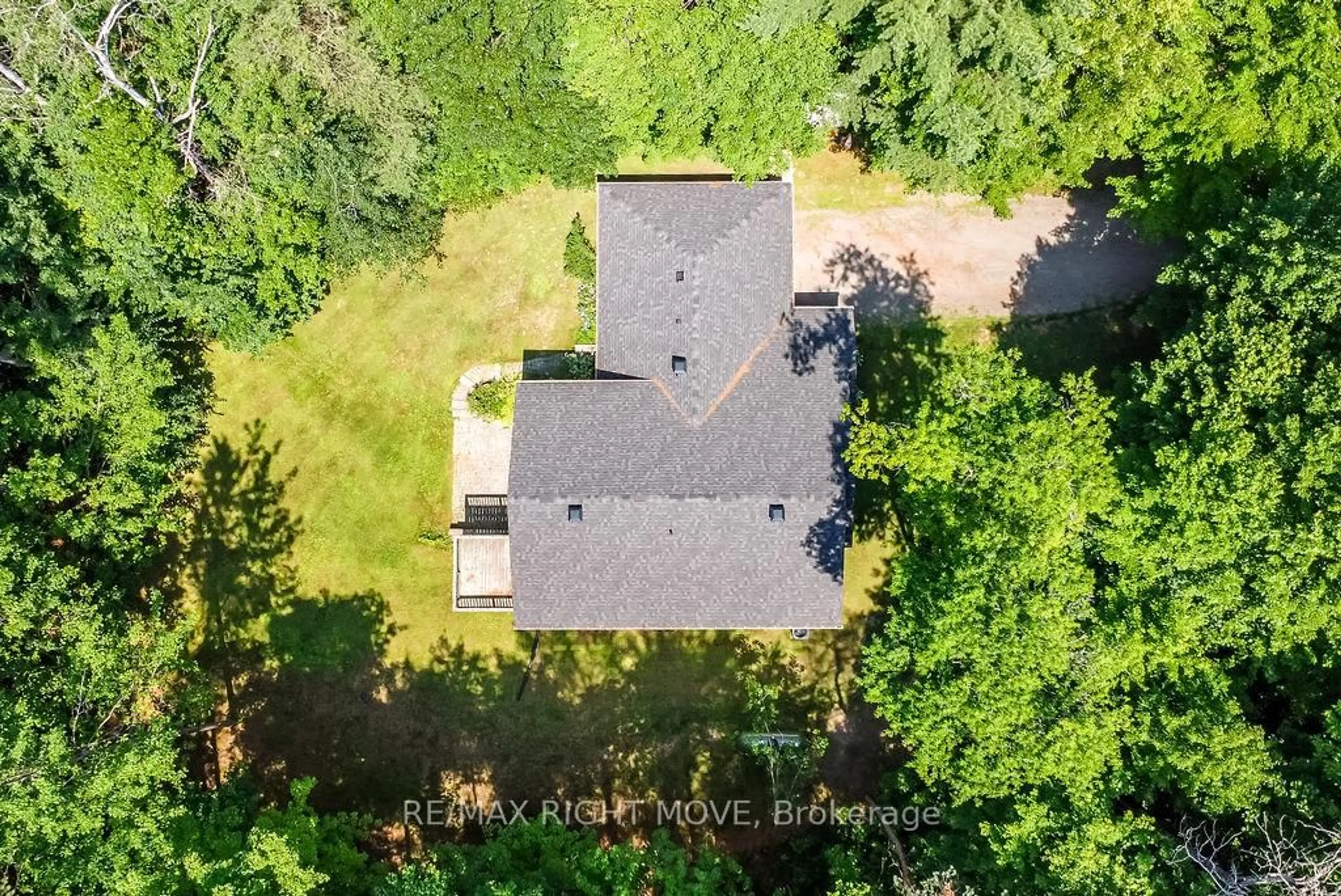 A pic from outside/outdoor area/front of a property/back of a property/a pic from drone, forest/trees view for 1011 Talbot Tr, Gravenhurst Ontario P0E 1N0