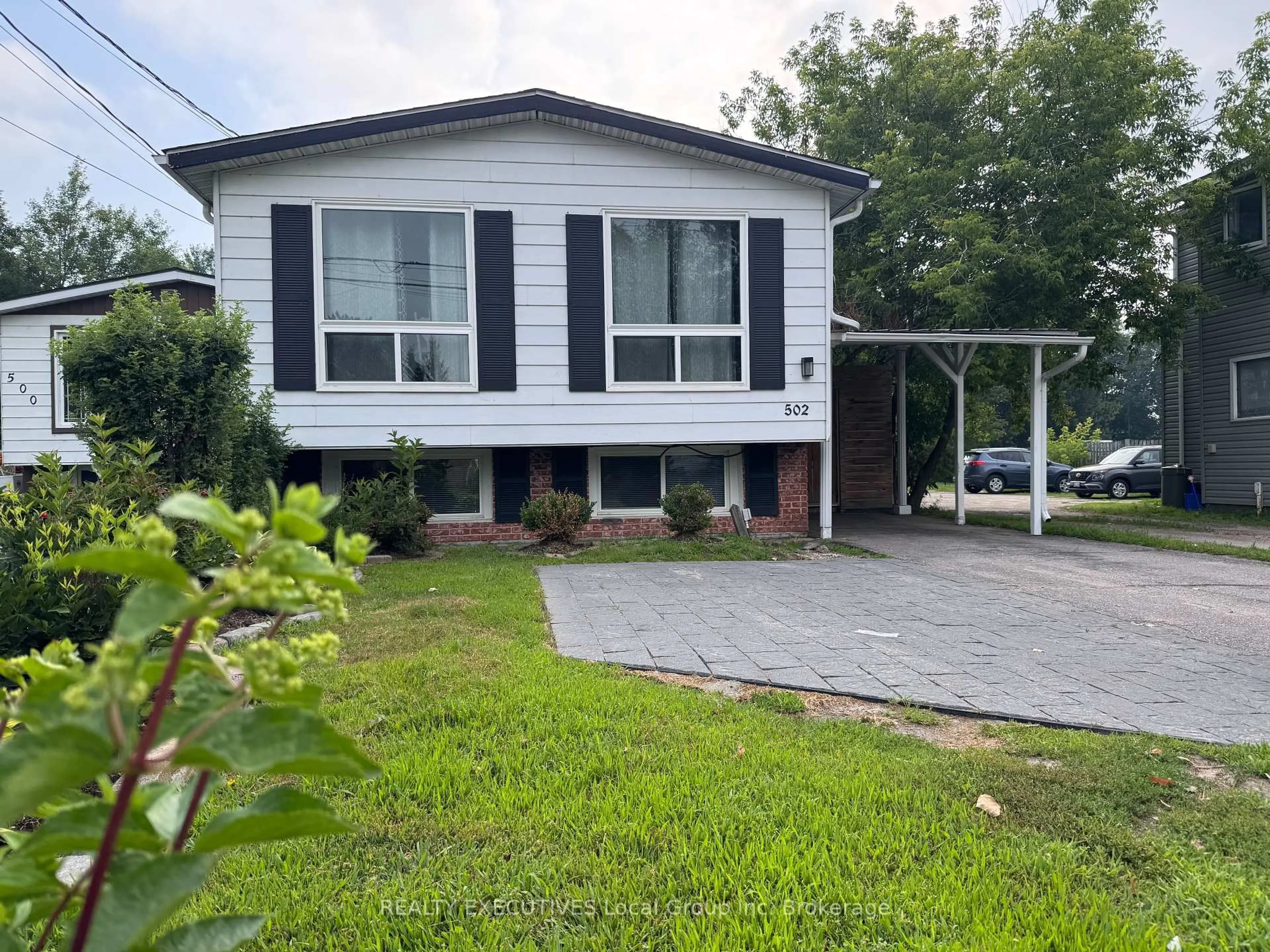 Home with vinyl exterior material, street for 502 Lakeshore Dr, North Bay Ontario P1A 2E4