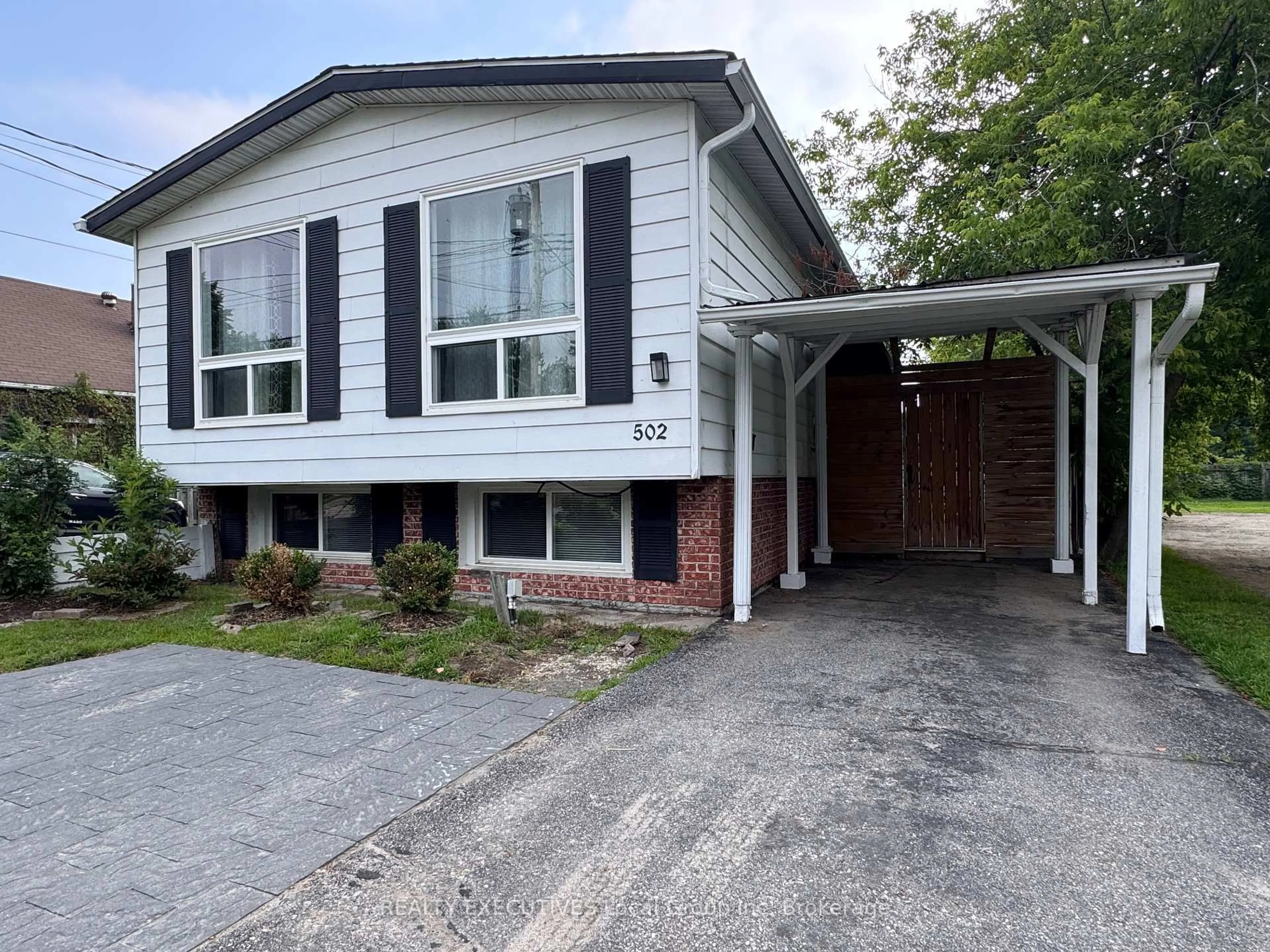 Home with vinyl exterior material, street for 502 Lakeshore Dr, North Bay Ontario P1A 2E4