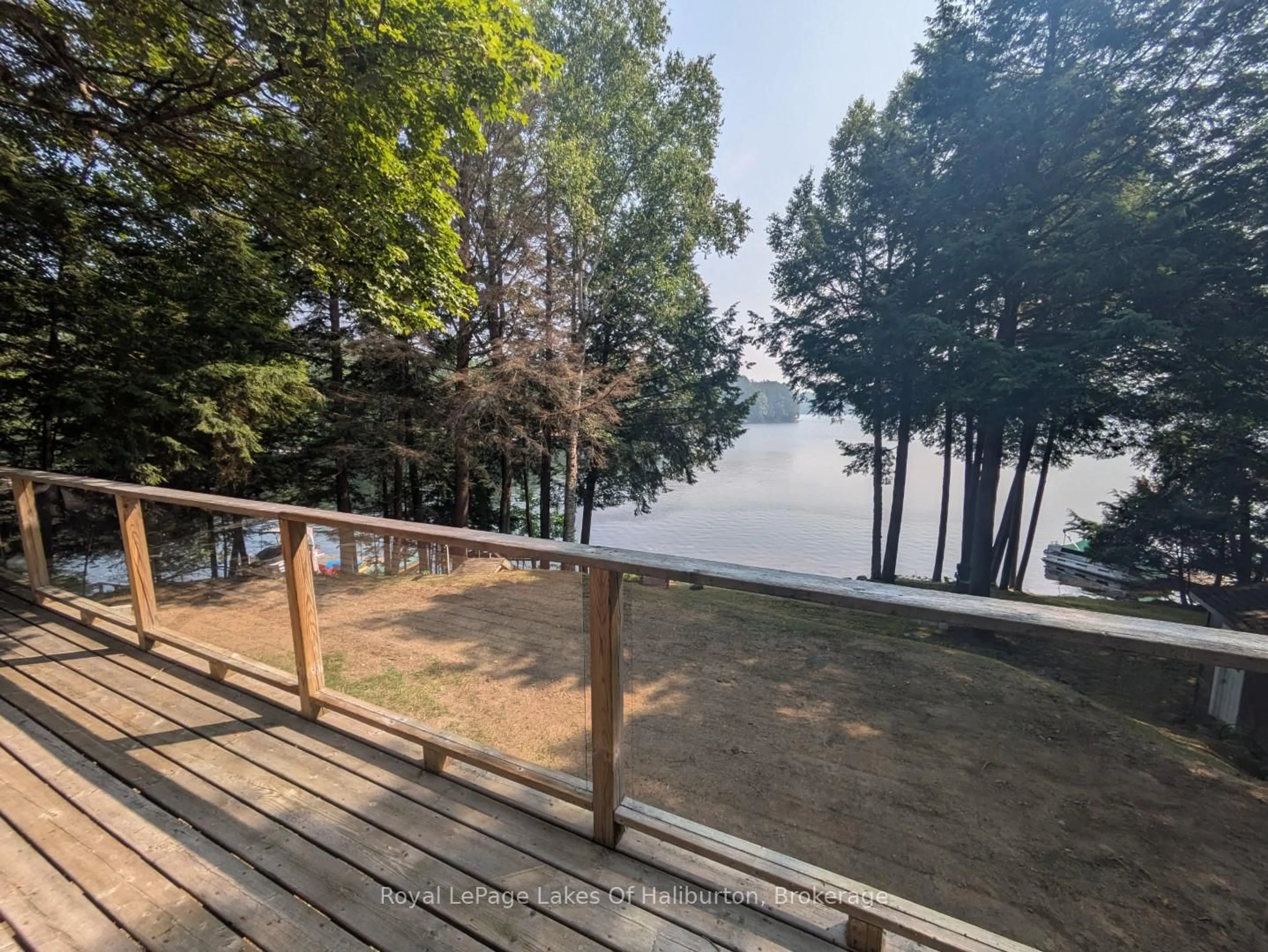 A pic from outside/outdoor area/front of a property/back of a property/a pic from drone, water/lake/river/ocean view for 1051 Autumn Lane, Dysart et al Ontario K0M 1S0