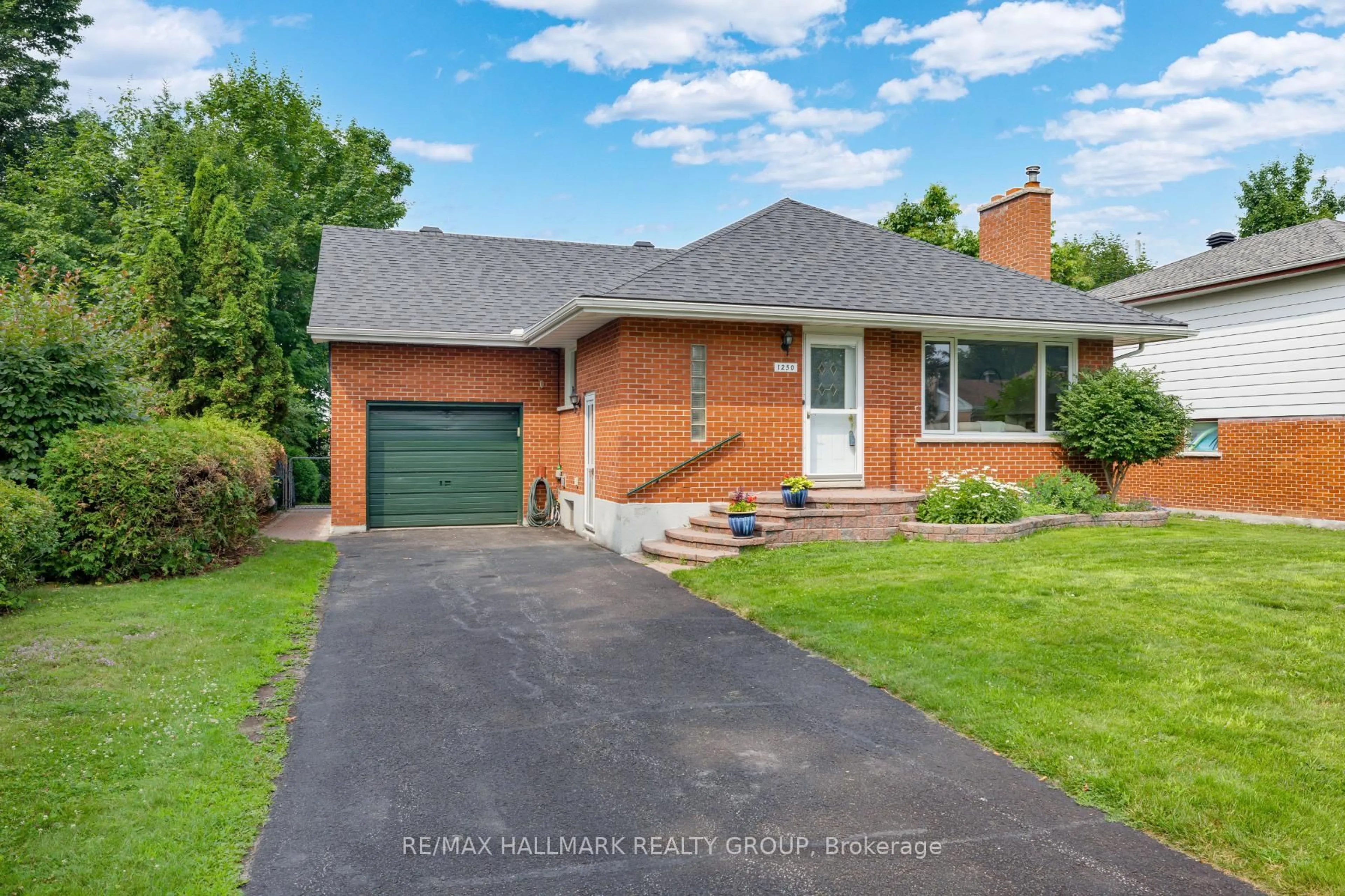 Home with brick exterior material, street for 1250 Woodside Dr, Ottawa Ontario K2C 2G9