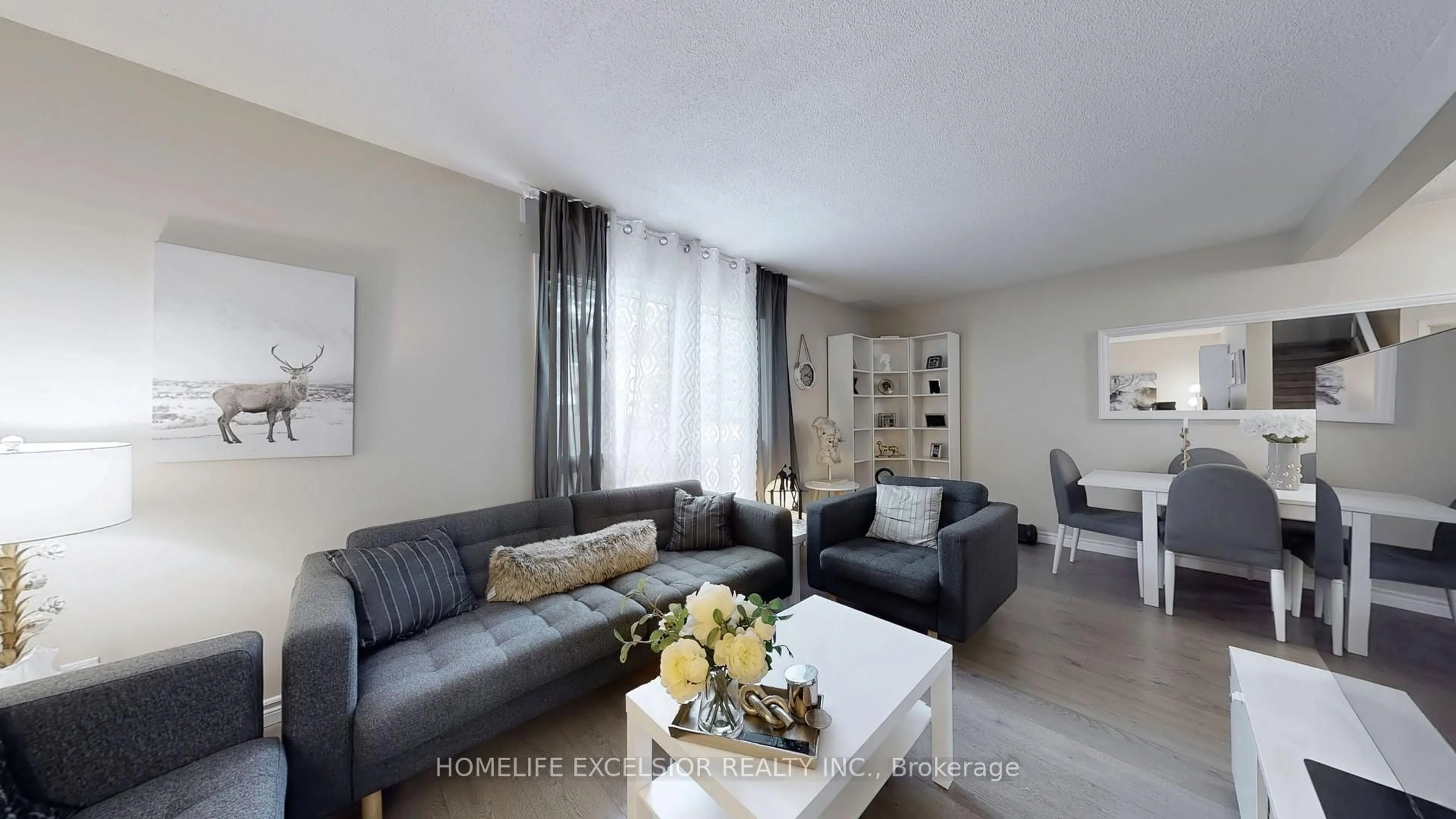 Living room with furniture, unknown for 618 Barton St #33, Hamilton Ontario L8E 4X3