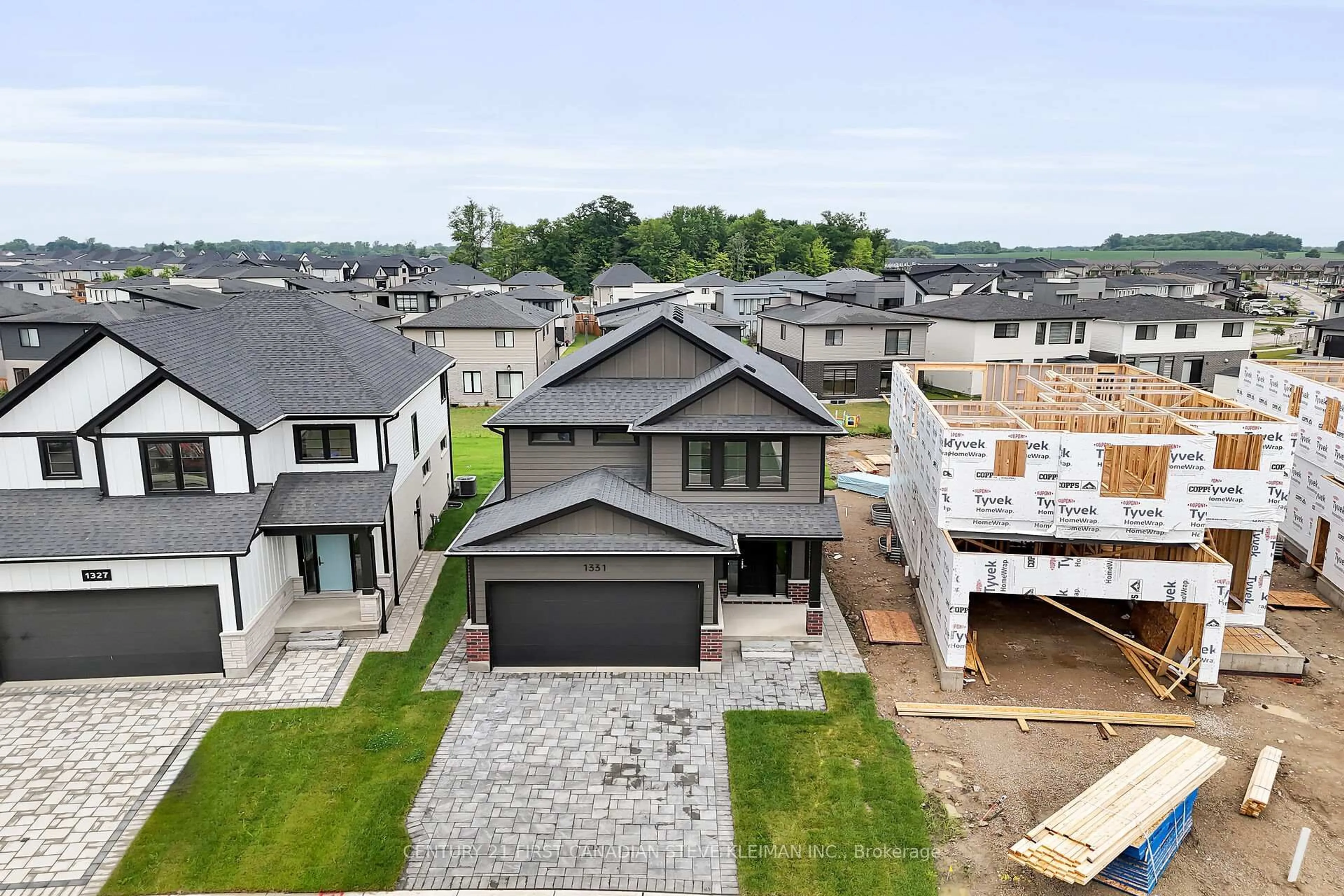A pic from outside/outdoor area/front of a property/back of a property/a pic from drone, street for 1331 Bush Hill Link Ave, London North Ontario N6G 0X6
